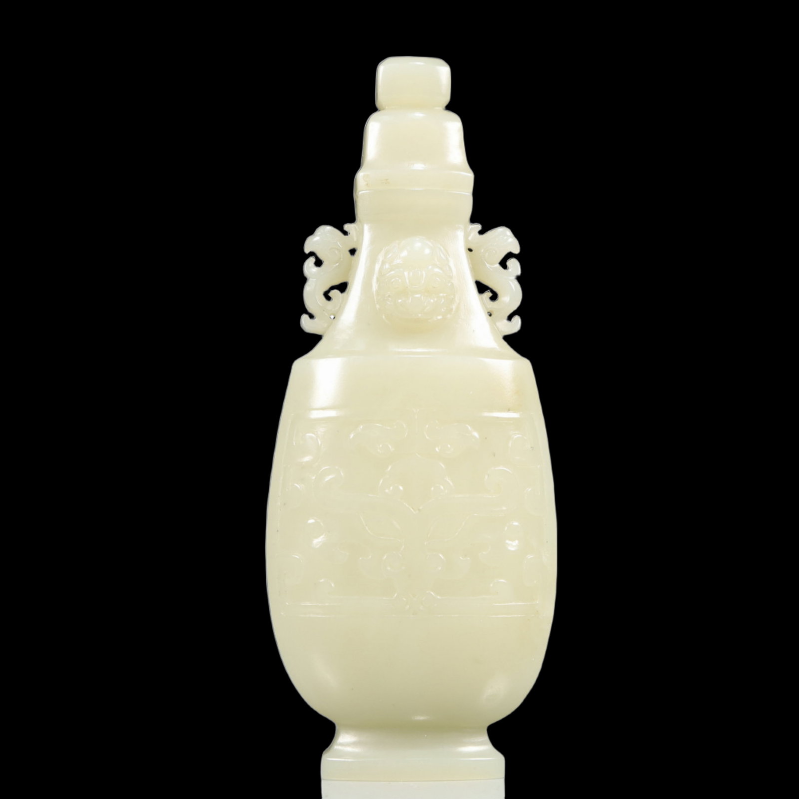 An Exquisite White Jade Beast-Face Pattern Double-Ears Bottle: An Exquisite White Jade Beast-Face Pattern Double-Ears Bottle,Qing Dynasty, China,Size:2.6inx1inx6.3in,Weight:200g 白玉兽面纹双耳瓶带盖,
