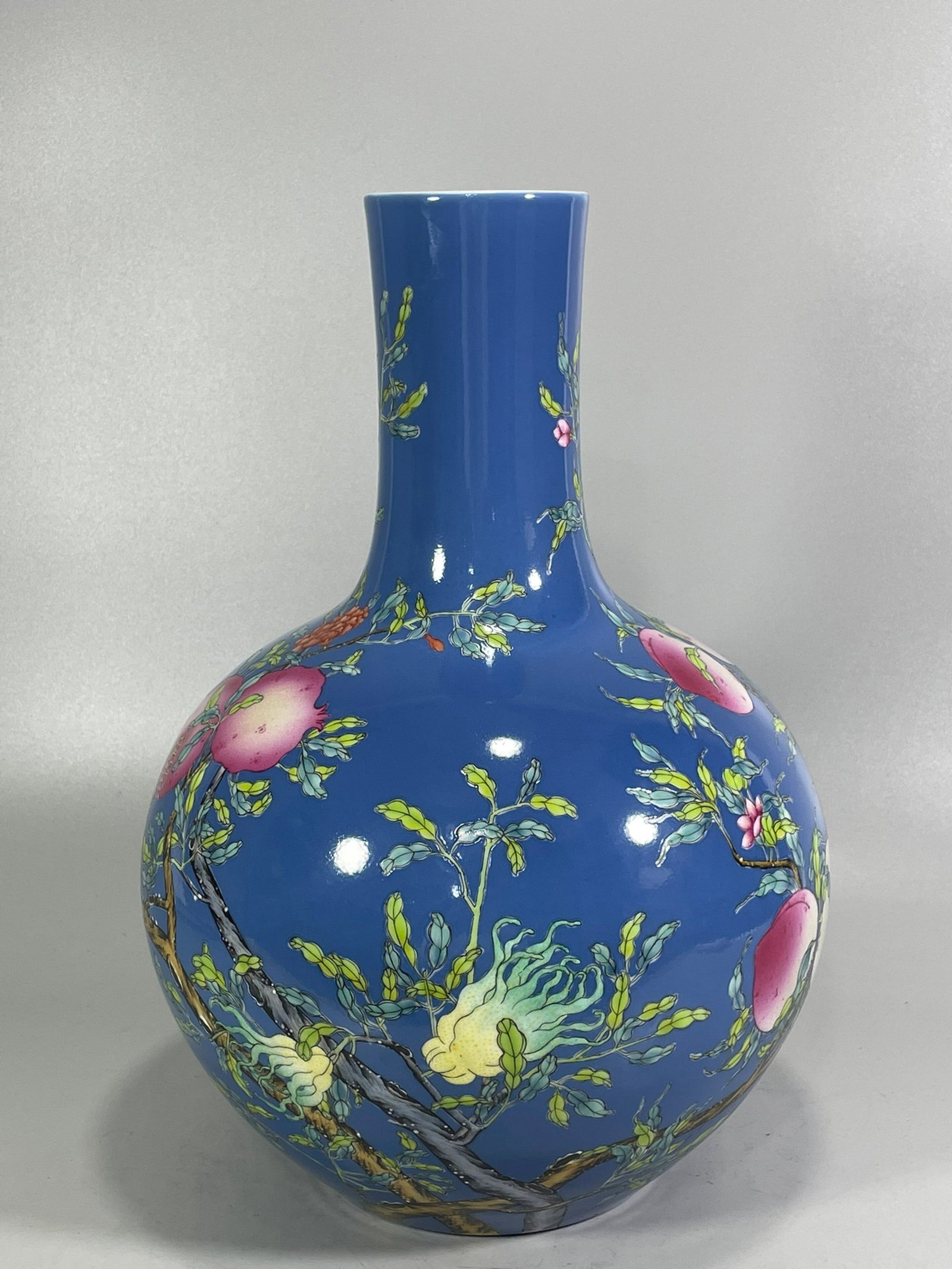 A Rare Sapphire Blue Glazed Famille-Rose Bats and Peach Pattern Vase: A Rare Sapphire Blue Glazed Famille-Rose Bats and Peach Pattern Vase,Qing Dynasty,China,Yongzheng Six-character Mark,Size:14.2inx10in