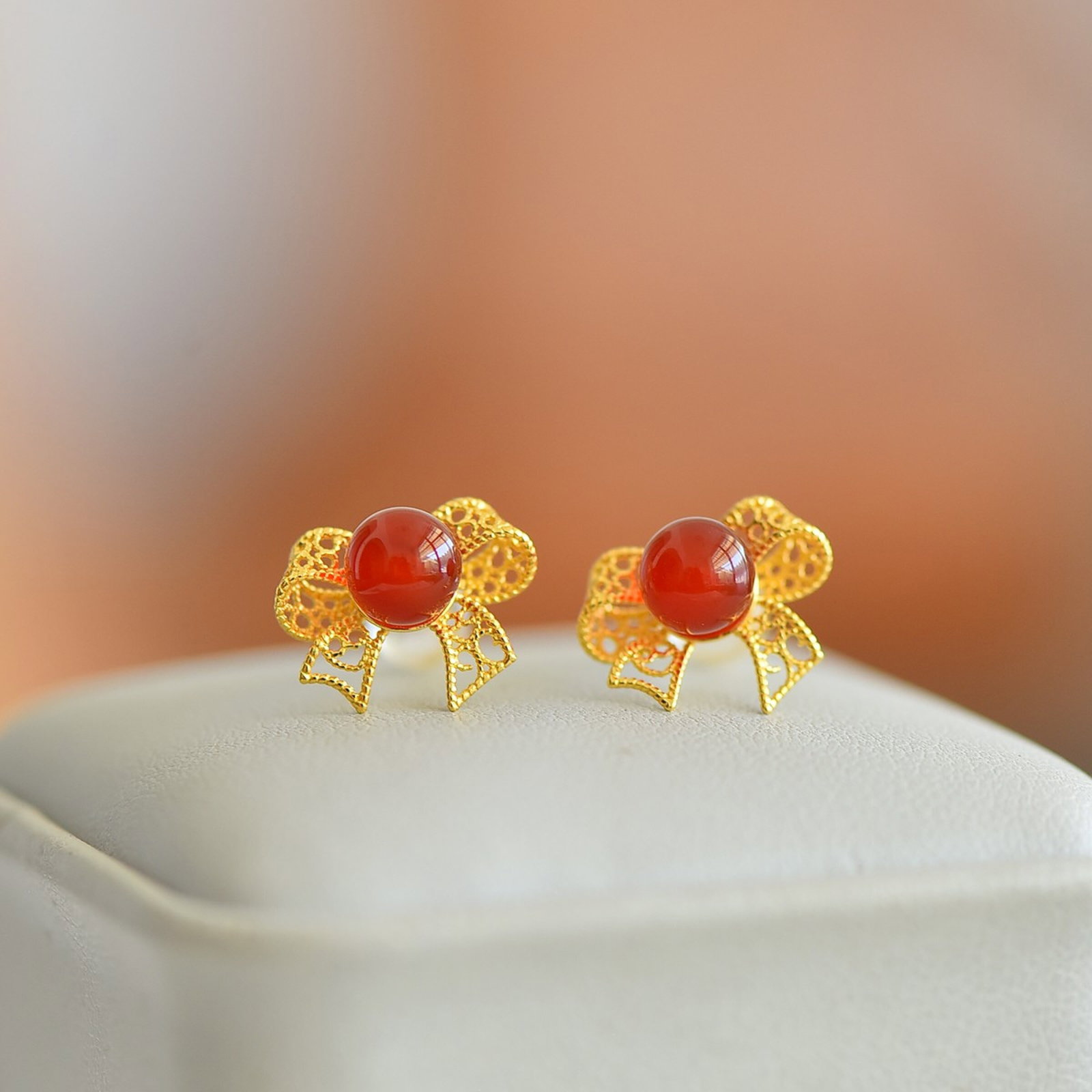 A Pair of Exquisite Sterling Silver-Gold Plated Inlaid Red Agate Earrings: A Pair of Exquisite Sterling Silver-Gold Plated Inlaid Red Agate Earrings,Size:6mmx6mm 一对纯银镀金镶红玛瑙耳钉