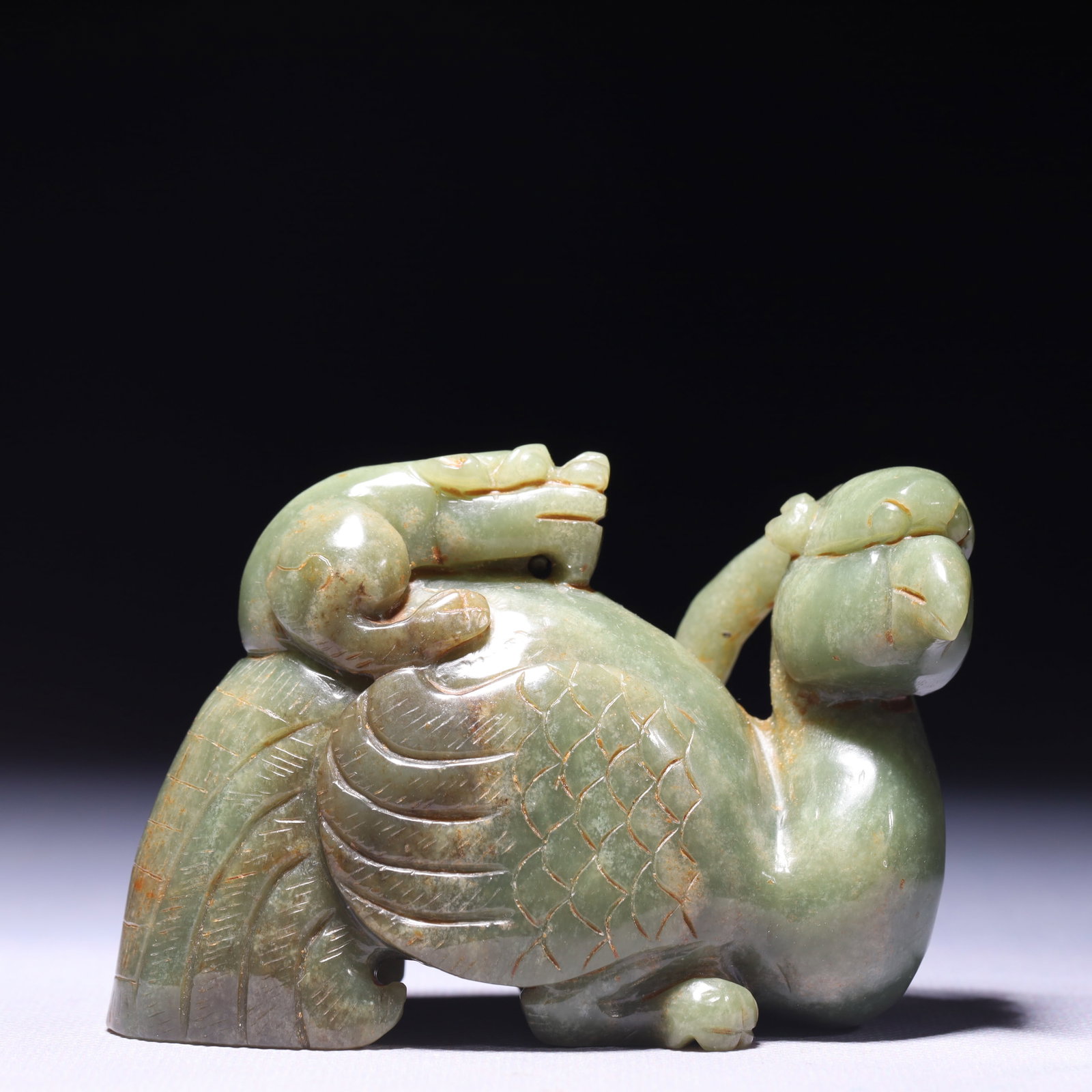 An Exquisite Green Jade Phoenix Ornament: An Exquisite Green Jade Phoenix Ornament,Qing Dynasty,China,Size:3.9inx1.8inx2.8in,Weight:375g 青玉凤摆件,中国清代