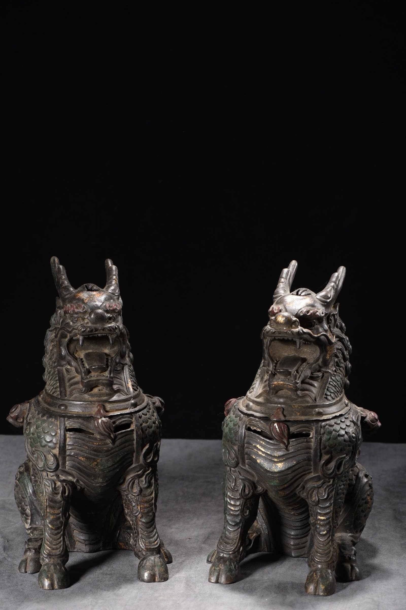 A Pair of Exquisite Bronze Painted Color Kylin Censers: A Pair of Exquisite Bronze Painted Color Kylin Censers,Qing Dynasty,China,Size:11.8inx6.3inx10.2in,Weight:7475g