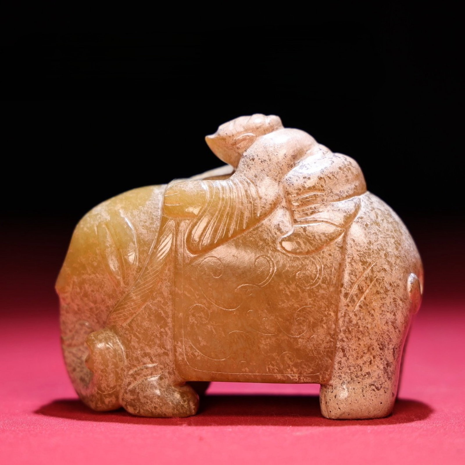 An Exquisite Archaic Jade Elephant Ornament: An Exquisite Archaic Jade Elephant Ornament,Ancient Time,China,Size:76mmx63mmx36mm,Weight:267g 高古玉象摆件,中国远古时期