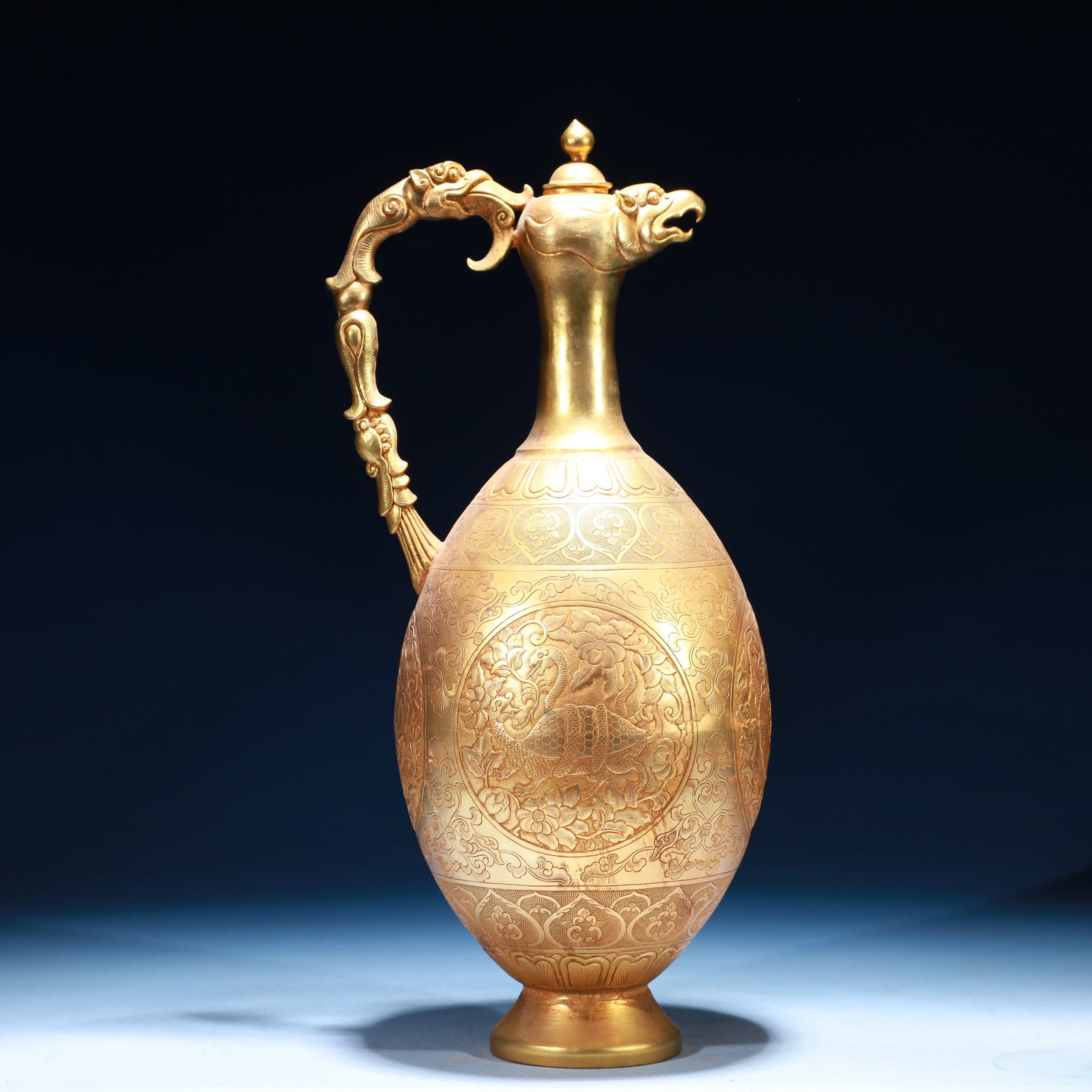 An Exquisite Gilt Bronze Auspicious Beast Pattern Ewer: An Exquisite Gilt Bronze Auspicious Beast Pattern Ewer,Qing Dynasty,China,Size:6.7inx15.7inx6.7in,Weight:2450 铜鎏金瑞兽纹执壶,中国清&