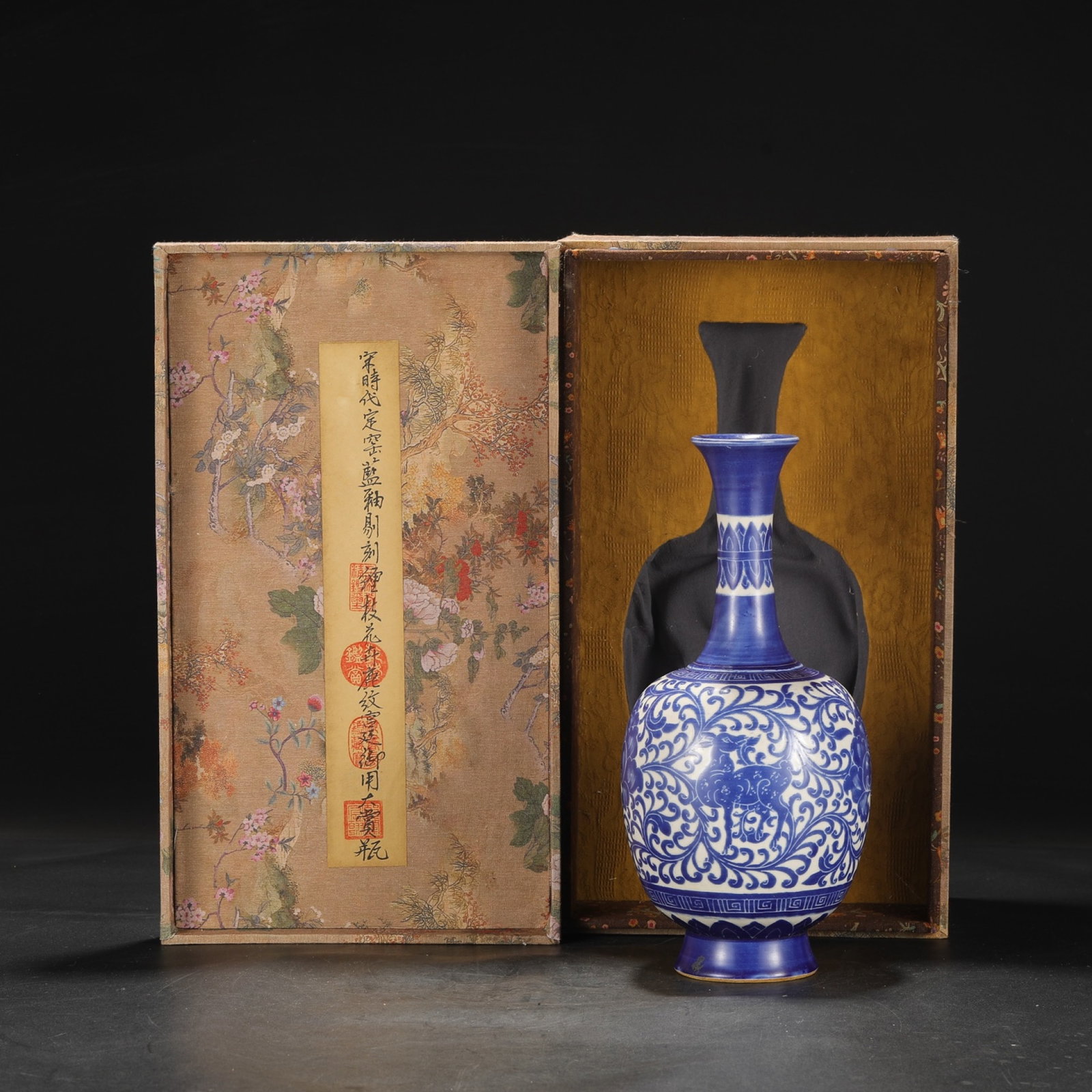 A Rare Ding yao Blue Glazed Lotus and Deer Pattern Vase: A Rare Ding yao Blue Glazed Lotus and Deer Pattern Vase,Song Dynasty,China,Size:12.4inx5.3in 定窑蓝釉缠枝莲鹿纹瓶,中国宋&#