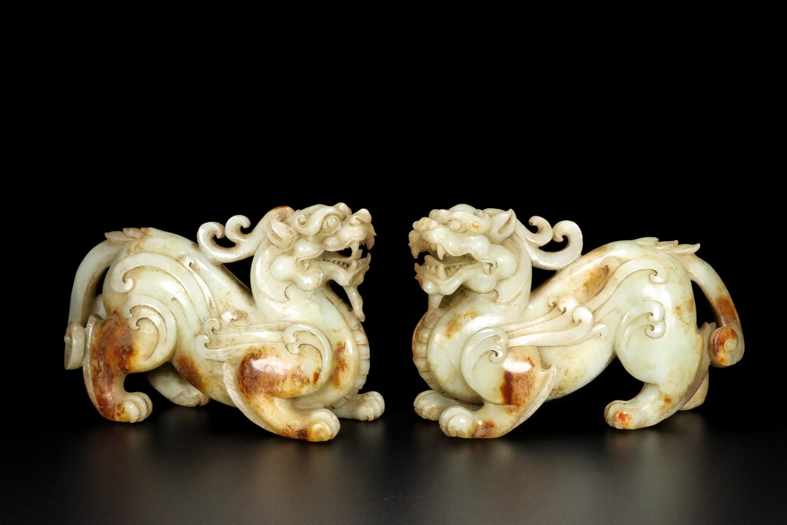 A Pair of Exquisite White Jade Auspicious Beast Ornaments: A Pair of Exquisite White Jade Auspicious Beast Ornaments,Qing Dynasty,China,Size:7.5inx5.1inx2.8in,Weight:3151g 一对白玉瑞兽摆件,中国଀