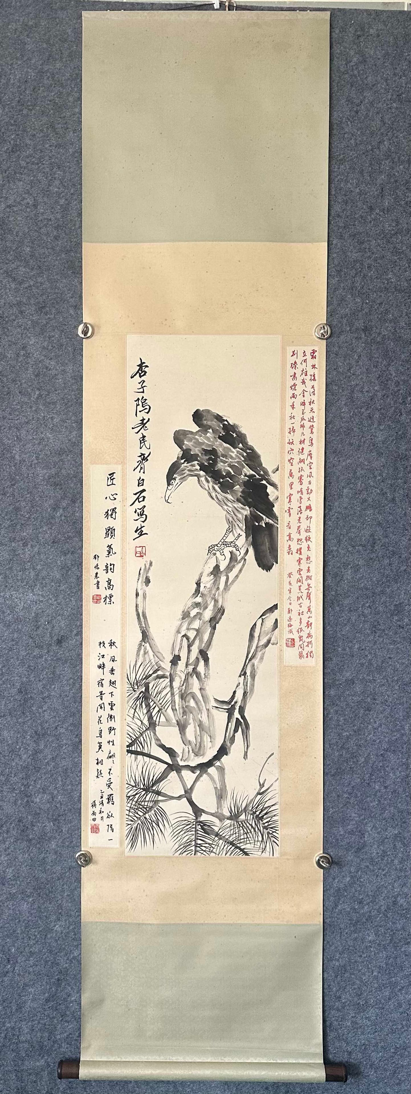 A Chinese Vertical Scroll Ink Painting of Pine and Eagle on Paper: A Chinese Vertical Scroll Ink Painting of Pine and Eagle on Paper,Qi Baishi,Size:13.2inx44.9in 一幅中国水墨松鹰画立轴,齐白