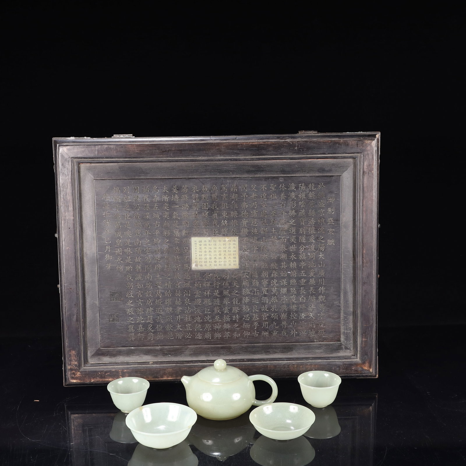 A Set of Fine White Jade Teaware: A Set of Fine White Jade Teaware,Qing Dynasty, China,Qianlong Four-character Mark,Size:(Teapot)5.1inx3.5inx2.8in,(Cup)2.4inx1.4in,3.5inx1.2in,(Plate)3.3inx1in,(Box)17.7inx13.8inx5.9in,Weight:300g 