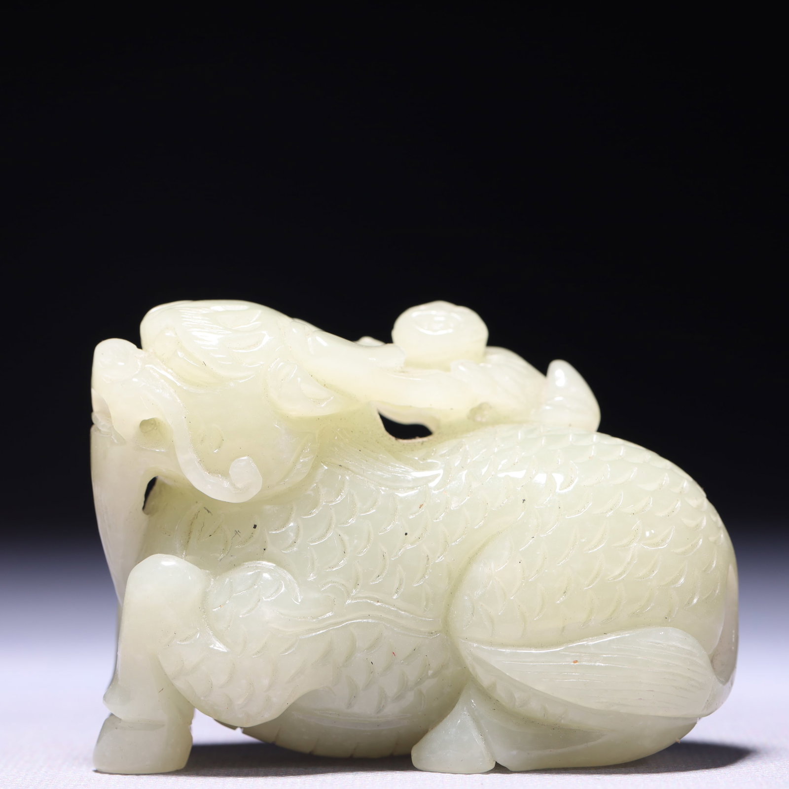 An Exquisite White Jade Beast Ornament: An Exquisite White Jade Beast Ornament,Qing Dynasty,China,Size:3inx1.2inx2in,Weight:228g 白玉兽摆件,中国清代
