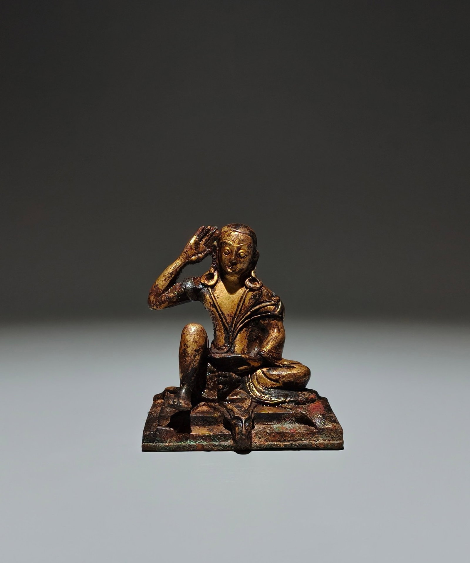 A Solemn Gilt Bronze Buddha Statue: A Solemn Gilt Bronze Buddha Statue,The Ming and Qing Dynasties China,Size:3.5inx3.1inx2.4in 铜鎏金佛像,中国明清时期