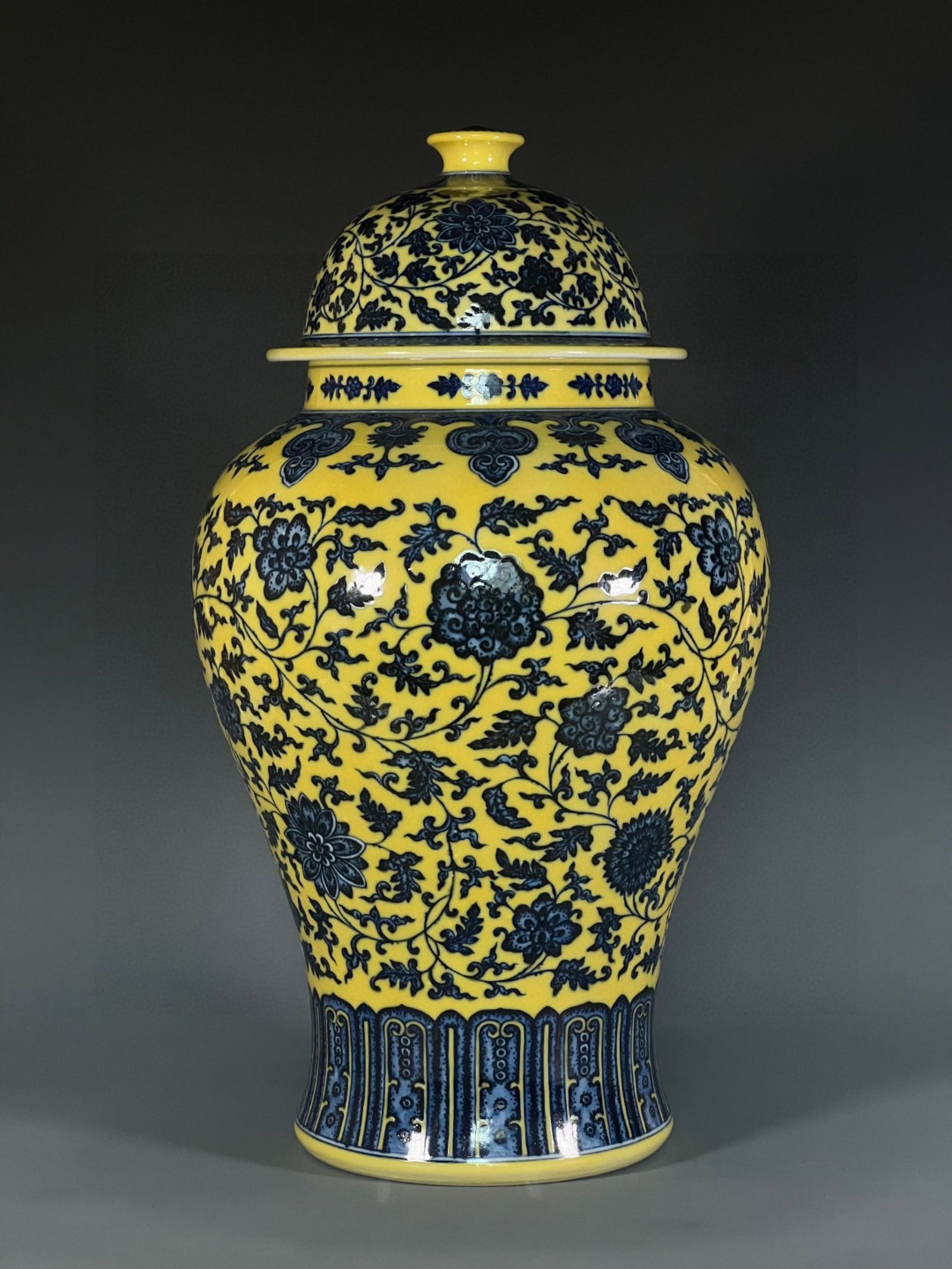A Huge Yellow Ground Blue and White Lotus Pattern Jar with Cover: A Huge Yellow Ground Blue and White Lotus Pattern Jar with Cover,Qing Dynasty,China,Qianlong Six-character Mark,Size:19.9inx7.4in 黄地青花缠枝莲纹௢