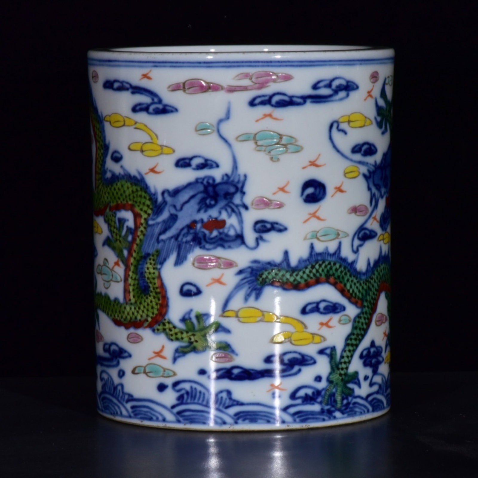 An Exquisite Blue and White Doucai Auspicious Cloud and Dragon Pattern Brush Pot: An Exquisite Blue and White Doucai Auspicious Cloud and Dragon Pattern Brush Pot,Qing Dynasty,China,Qianlong Six-character Mark,Size:5.7inx4.9in 青花斗彩祥云龙