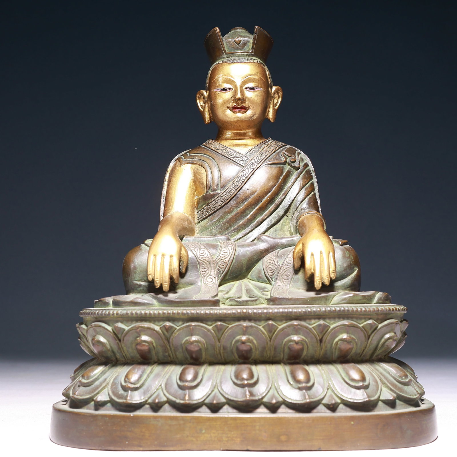 A Solemn Gilt Bronze Statue of Guru: A Solemn Gilt Bronze Statue of Guru,Qing Dynasty,China,Size:8.7inx6.3inx10.2in,Weight:4200g 铜鎏金上师像,中国清代