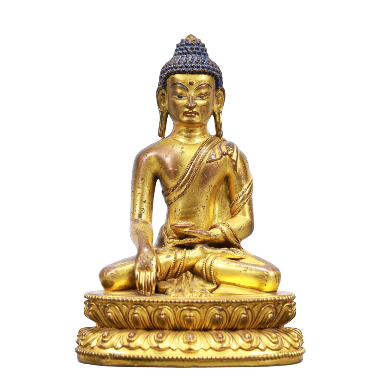 A Solemn Gilt Bronze Statue of Sakyamuni: A Solemn Gilt Bronze Statue of Sakyamuni,Ming Dynasty, China,Size:4.1inx3inx5.5in Weight:1000g 铜鎏金释迦摩尼像,中国明代