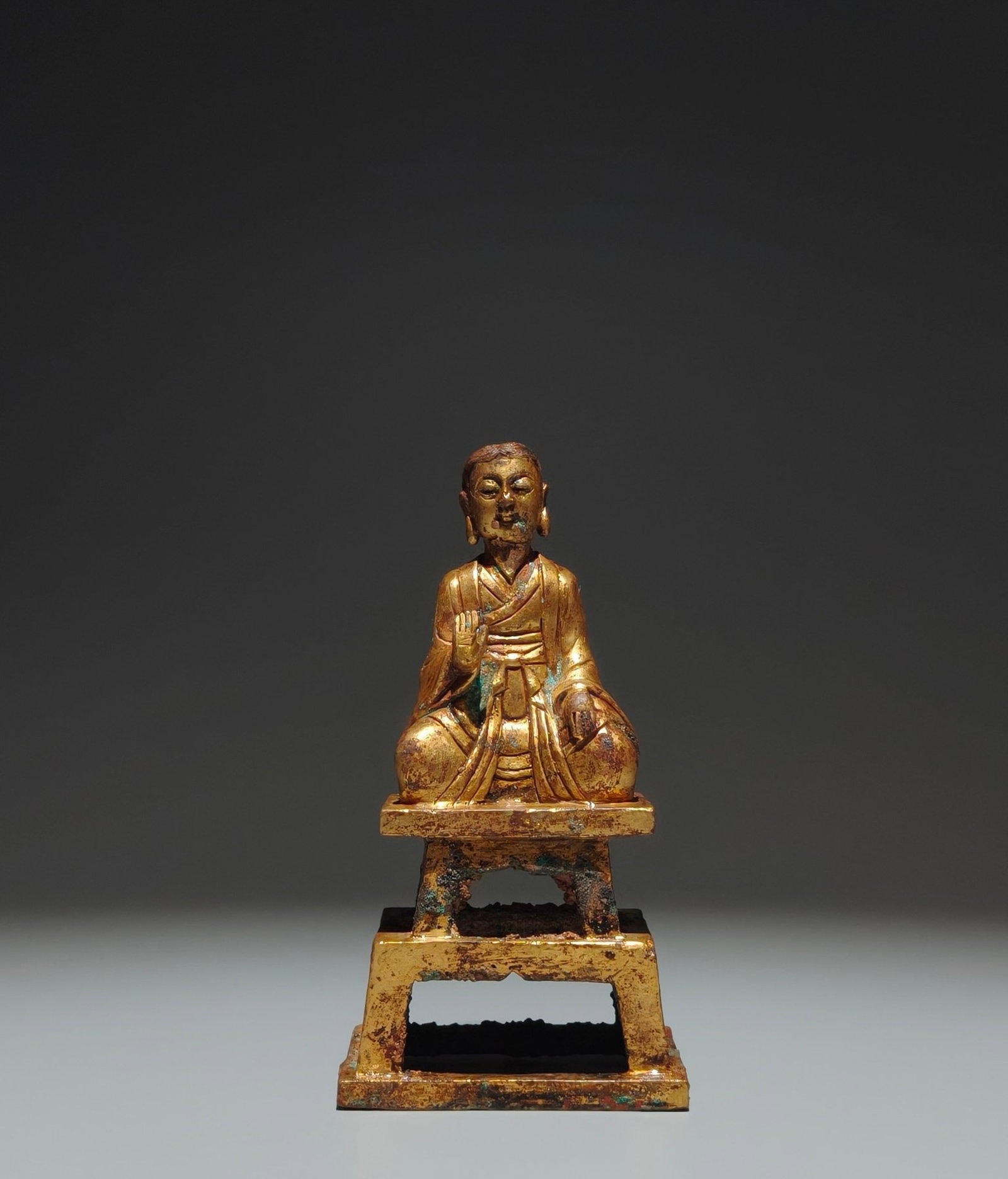 A Solemn Gilt Bronze Statue of Arhat: A Solemn Gilt Bronze Statue of Arhat,Liao Dynasty,China,Size:5.9inx3.1inx2.4in 铜鎏金罗汉像,中国辽代