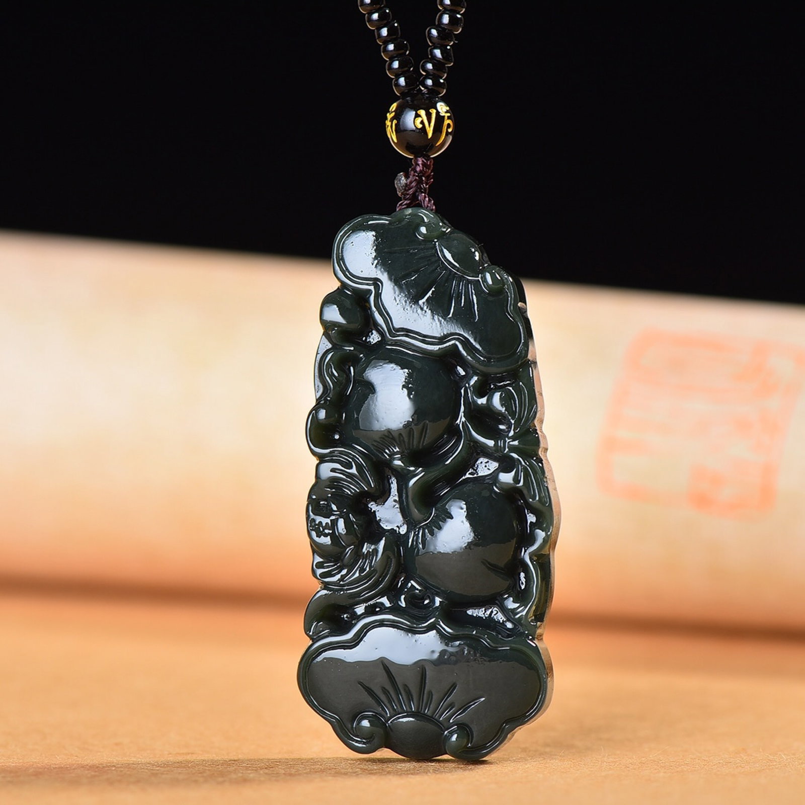 An Exquisite Sapphire Bats and Peach Pattern Pendant: An Exquisite Sapphire Bats and Peach Pattern Pendant,Size:66mmx30mm 青玉福寿纹吊坠