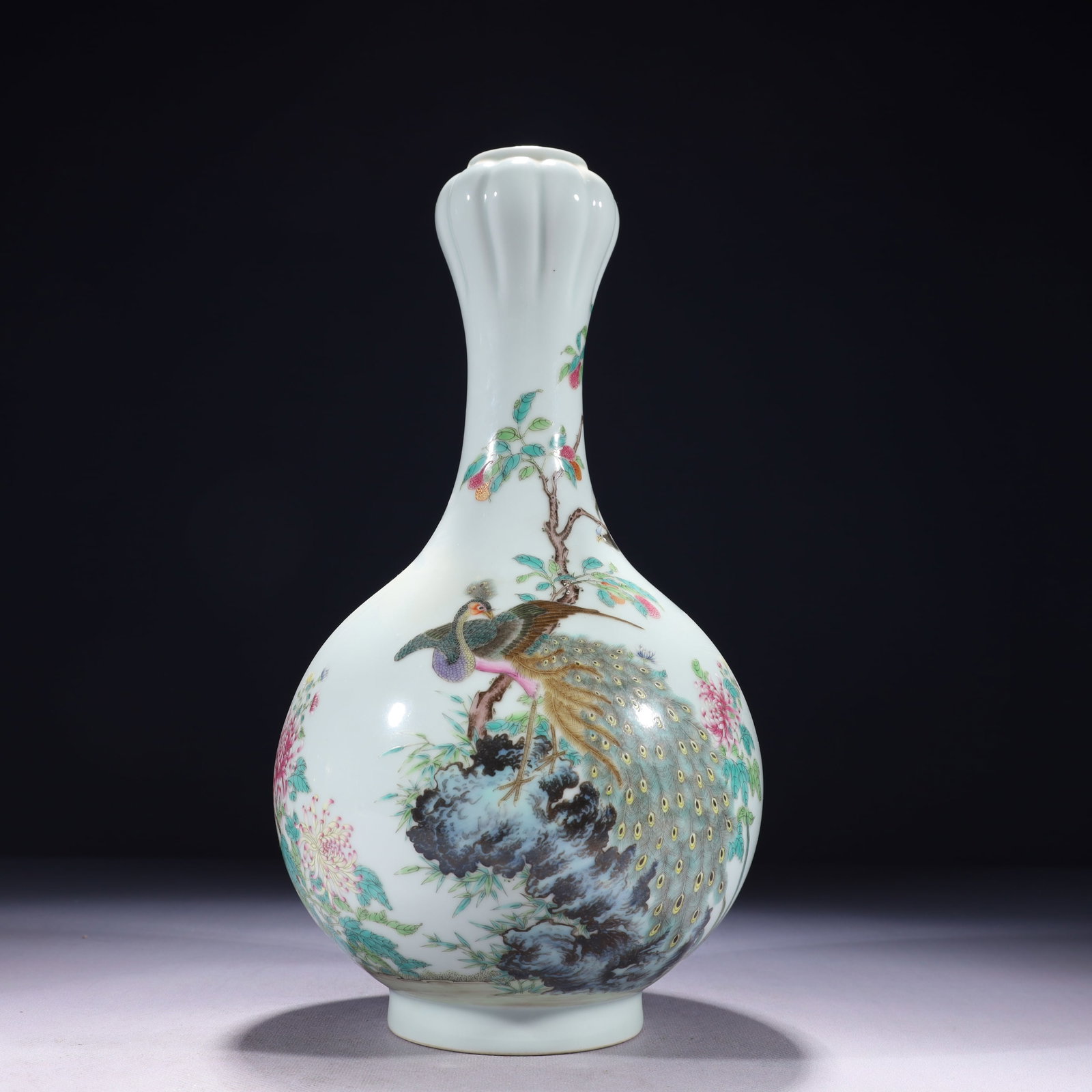 An Exquisite Famille-Rose Flower and Peacock Pattern Vase: An Exquisite Famille-Rose Flower and Peacock Pattern Vase,Qing Dynasty,China,Yongzheng Six-character Mark,Size:6.7inx13.8in,Weight:1700g 粉彩花卉孔雀纹瓶
