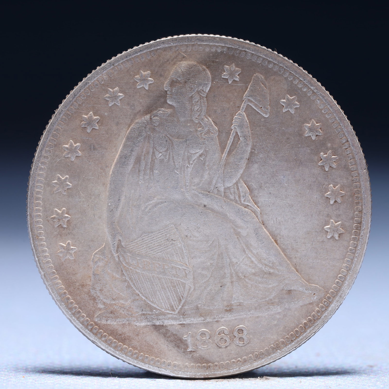 USA One Dollar 1868 Coin: American coin. IN GOD WE TRUST / LIBERTY / 1868 / UNITED STATES OF AMERICA / ONE DOL. Weight:26.9g.