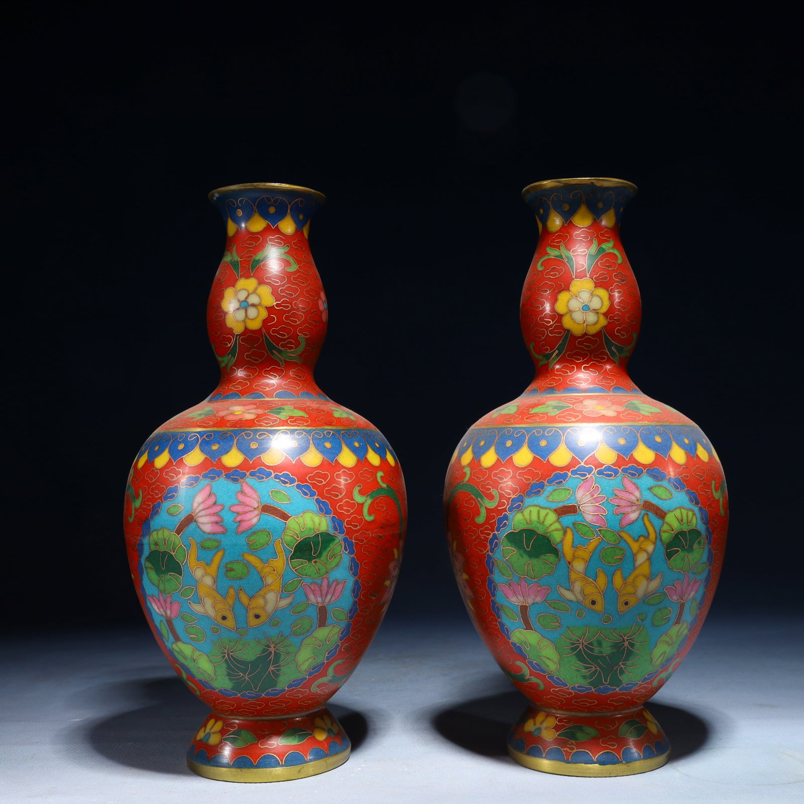 A Pair of Exquisite Cloisonne Flower and Fish Pattern Vases: A Pair of Exquisite Cloisonne Flower and Fish Pattern Vases,Qing Dynasty,China,Qianlong Four-character Mark,Size:9.8inx4.7inx4.7in,Weight:3000g