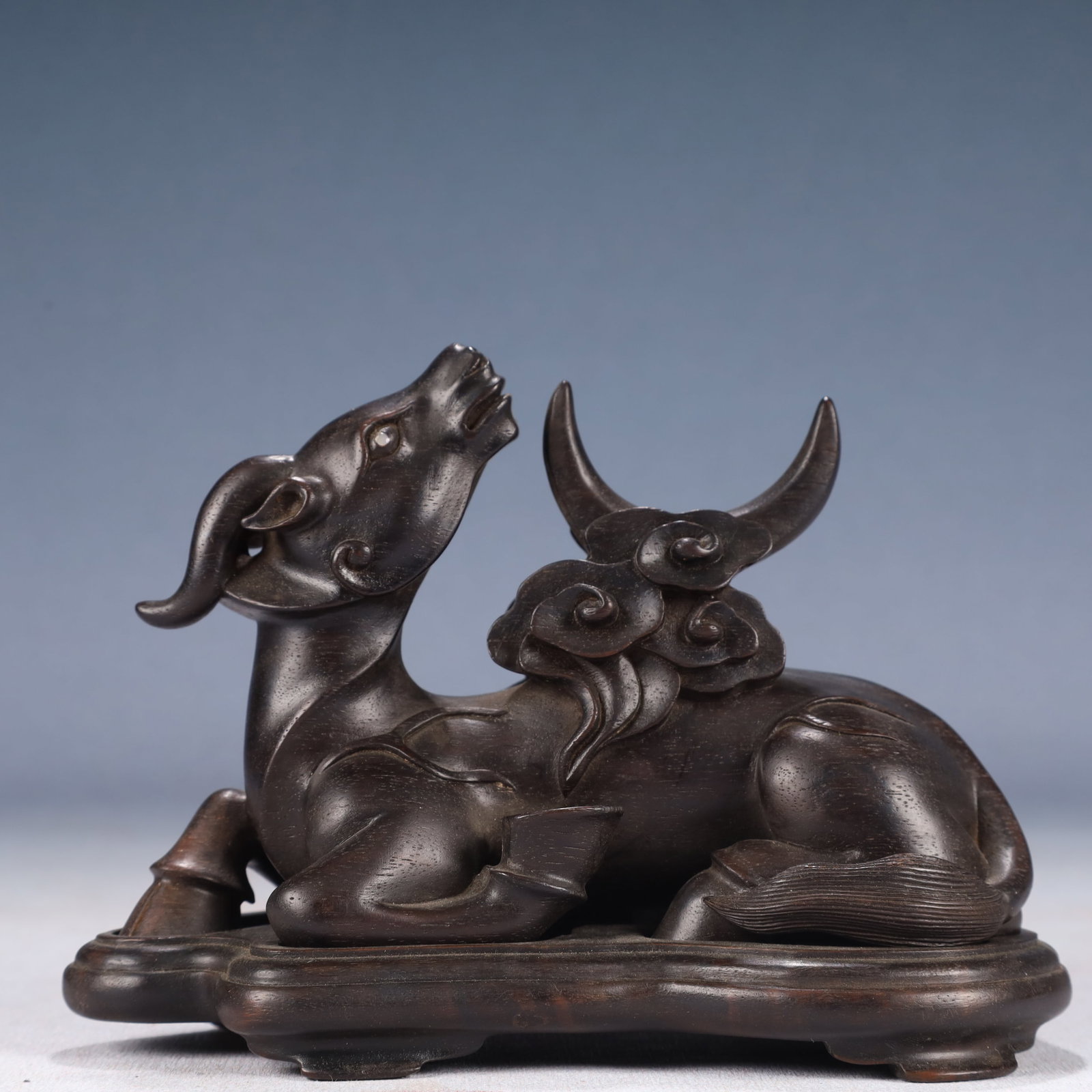 An Exquisite Zitanwood Auspicious Beast Ornament,With Base: An Exquisite Zitanwood Auspicious Beast Ornament,With Base,Qing Dynasty, China,Jiaqing Mark,Size:5.9inx3.1inx4.3in,Weight:300g 紫檀木瑞兽摆件,带底