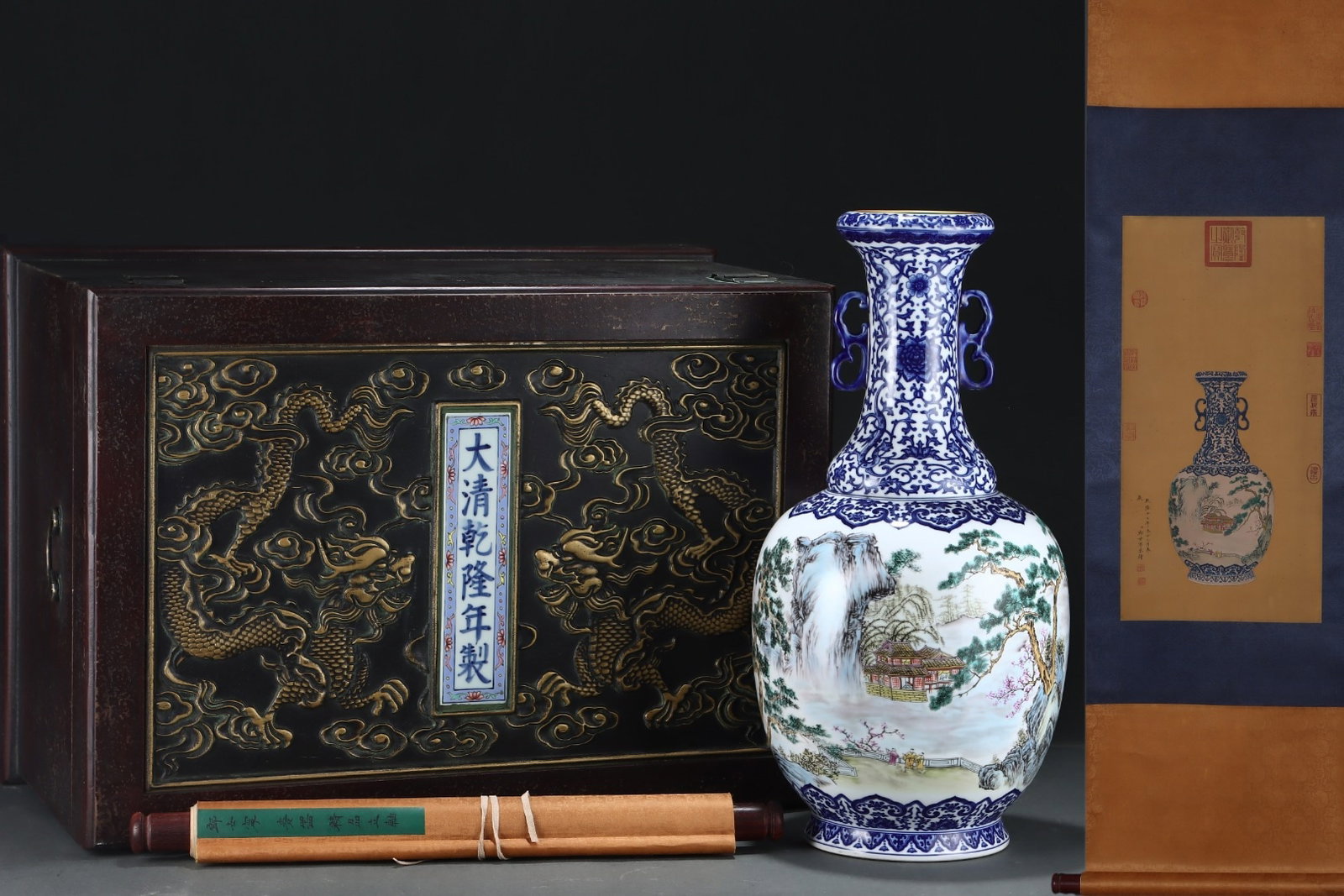 An Exquisite Blue and White Famille-Rose Landscape Pattern Painted Gold Double-Ears Vase,With: An Exquisite Blue and White Famille-Rose Landscape Pattern Painted Gold Double-Ears Vase,With Vertical Scroll Painting on Silk,Qing Dynasty,China,with Qianlong Six-character Mark,Size:21.5inx10.6in,Wi