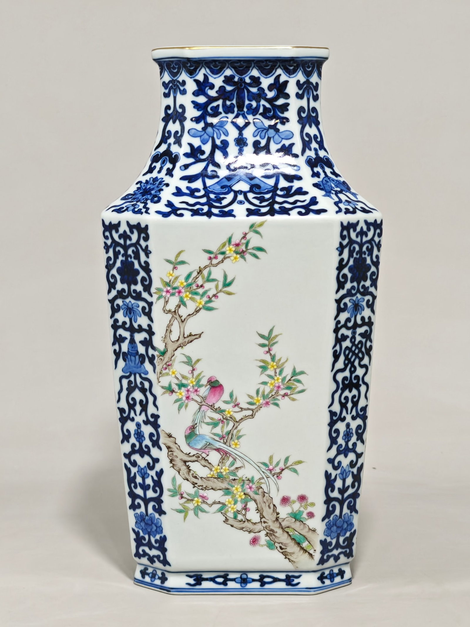 A Rare Blue and White Famille-Rose Flower and Bird Pattern Vase: A Rare Blue and White Famille-Rose Flower and Bird Pattern Vase,Qing Dynasty,China,Qianlong Six-character Mark,Size:13inx6.7in 青花粉彩花鸟纹瓶,中