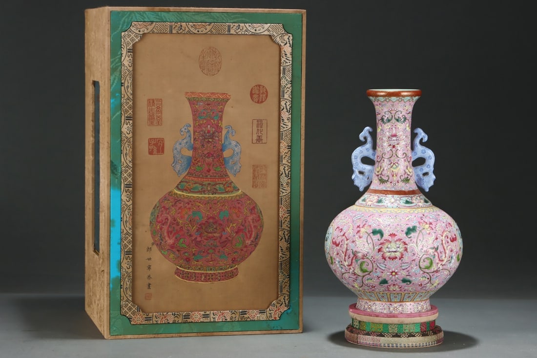 A RarePeach-Red Ground Famille Rose Gilt-Decorated Dragon-Handled Presentation Vase With Flowers And: A RarePeach-Red Ground Famille Rose Gilt-Decorated Dragon-Handled Presentation Vase With Flowers And Dragons,Qing Dynasty, China, Qianlong Four-character Mark,Size:13inx8.3in