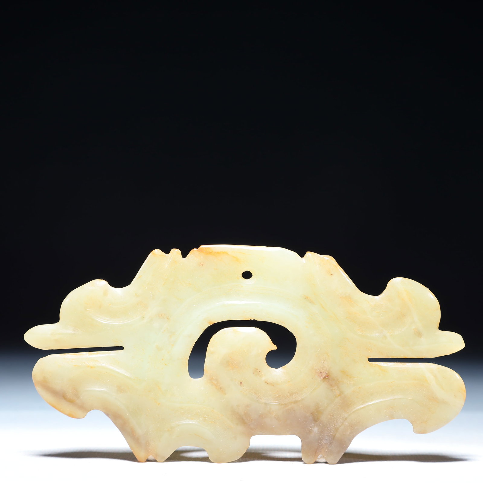 An Archaic Hongshan Culture White Jade Auspicious Cloud Pattern Pendant: An Archaic Hongshan Culture White Jade Auspicious Cloud Pattern Pendant,Ancient Time,China,Size:5.5inx2.2in,Weight:2.5g 红山文化白玉祥云纹挂