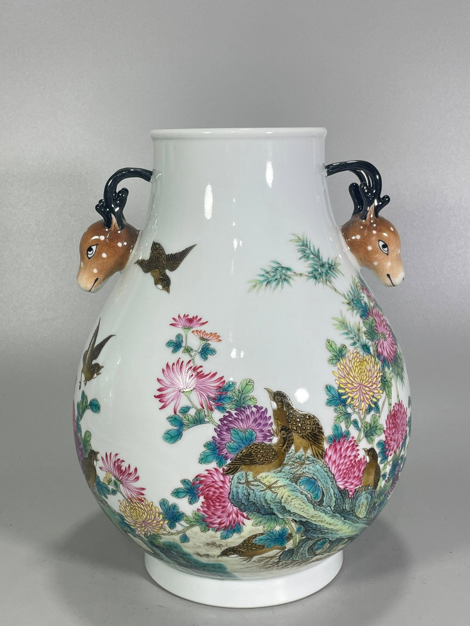 An Exquisite Famille-Rose Flower and Bird Pattern Deer-Ears Vase,with poem: An Exquisite Famille-Rose Flower and Bird Pattern Deer-Ears Vase,with poem,Qing Dynasty,China,Yongzheng Six-character Mark,Size:10.6inx8.1in 粉彩花鸟纹鹿耳