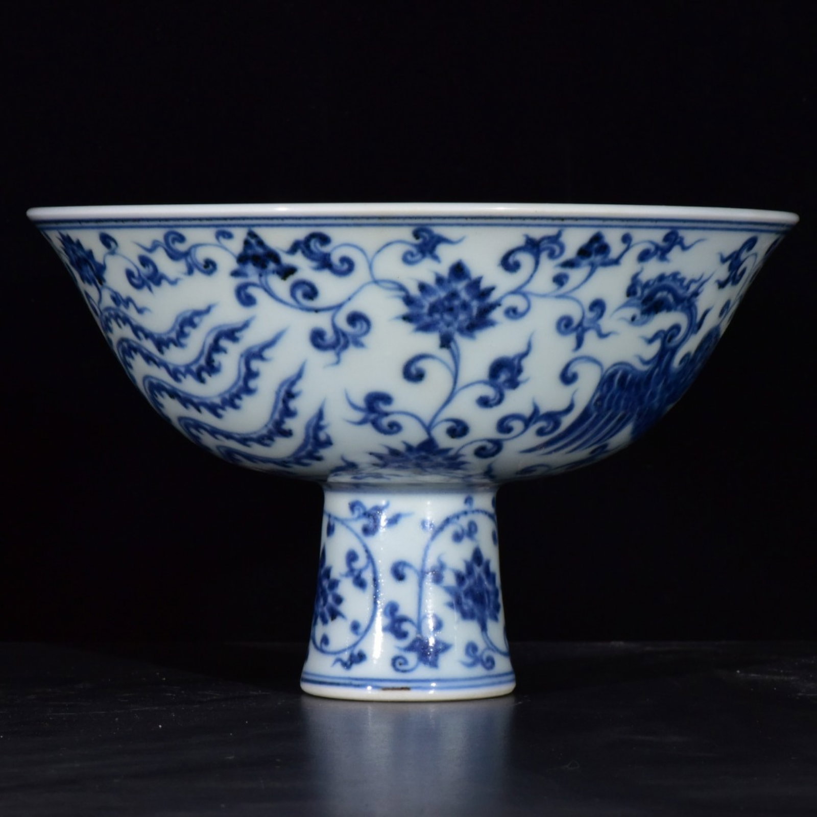 An Exquisite Blue and White Lotus and Phoenix Pattern Stem Bowl: An Exquisite Blue and White Lotus and Phoenix Pattern Stem Bowl,Ming Dynasty,China,Xuande Six-character Mark,Size:4.1inx6.7in 青花缠枝莲凤纹高足&#