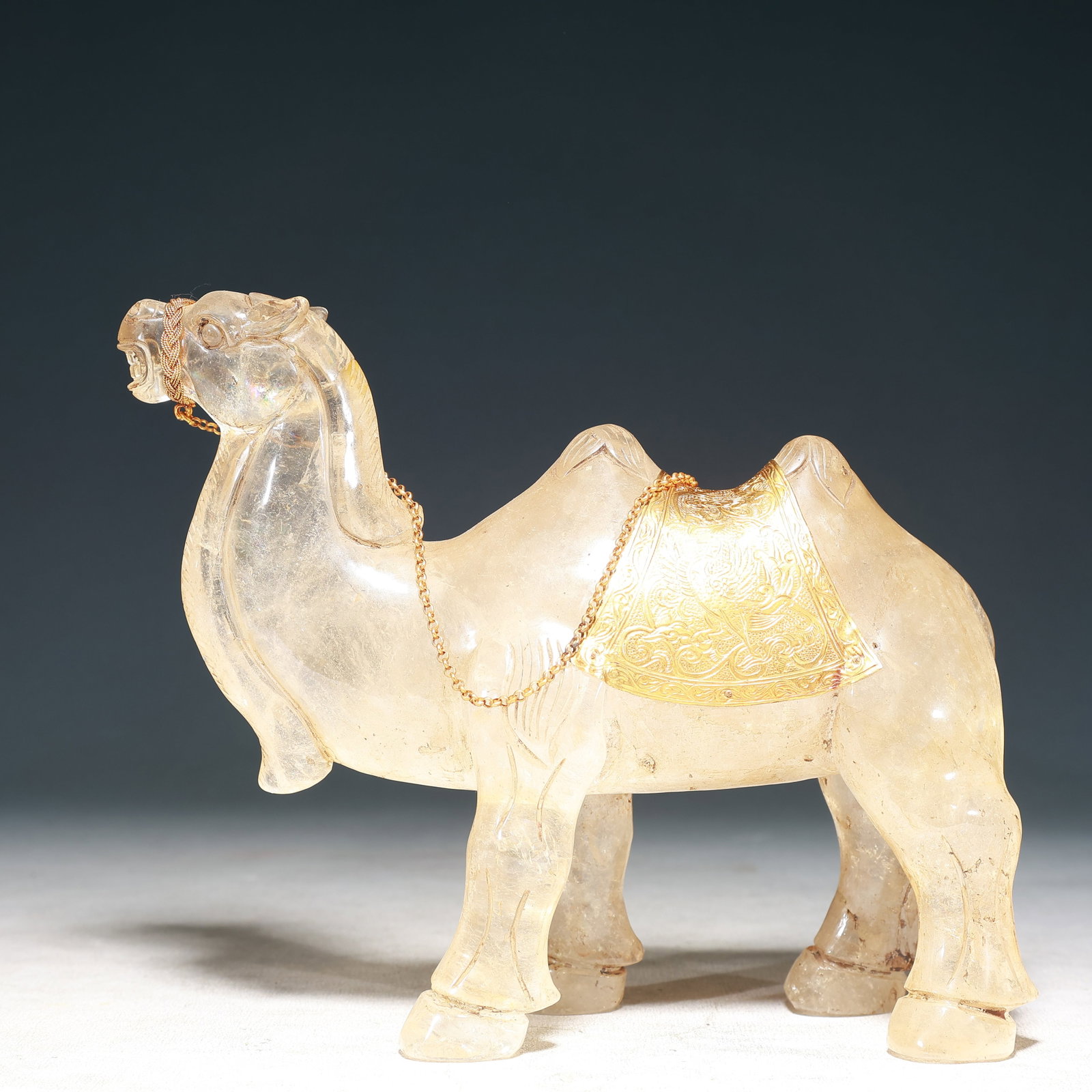 An Exquisite Crystal Cover with Gold Phoenix Pattern Camel Ornament: An Exquisite Crystal Cover with Gold Phoenix Pattern Camel Ornament,Qing Dynasty, China,Size:8.7inx3.1inx7.1in,Weight:1650g 水晶包金凤纹骆驼摆