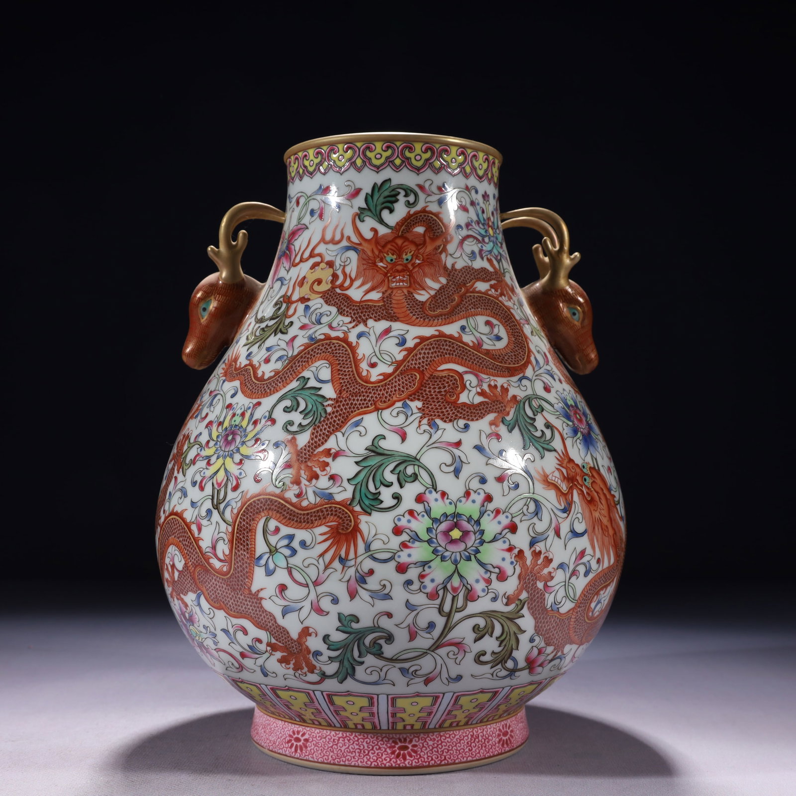 An Exquisite Famille-Rose Painted Gold Flower and Dragon Pattern Deer-Ears Vase: An Exquisite Famille-Rose Painted Gold Flower and Dragon Pattern Deer-Ears Vase,Qing Dynasty,China,Qianlong Six-character Mark,Size:7.1inx10.6in,Weight:2300g