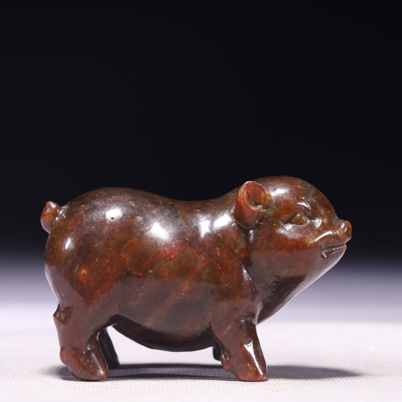 An Exquisite Archaic Jade Pig Ornament: An Exquisite Archaic Jade Pig Ornament,Ancient Time,China,Size:3inx1.4inx2in,Weight:214g 高古玉猪摆件,中国远古时期