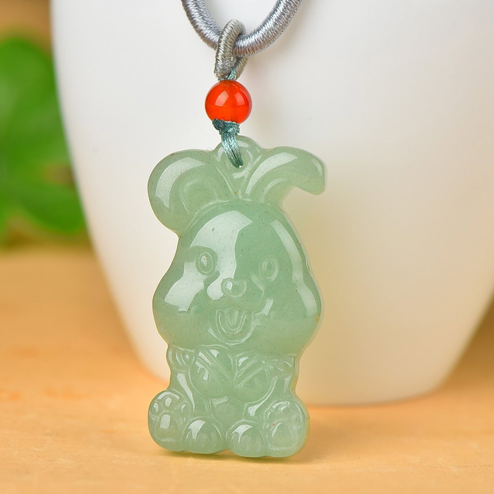An Exquisite Greenish Jade Rabbit Pattern Pendant: An Exquisite Greenish Jade Rabbit Pattern Pendant,Size:23mmx41mm 青玉兔纹挂件