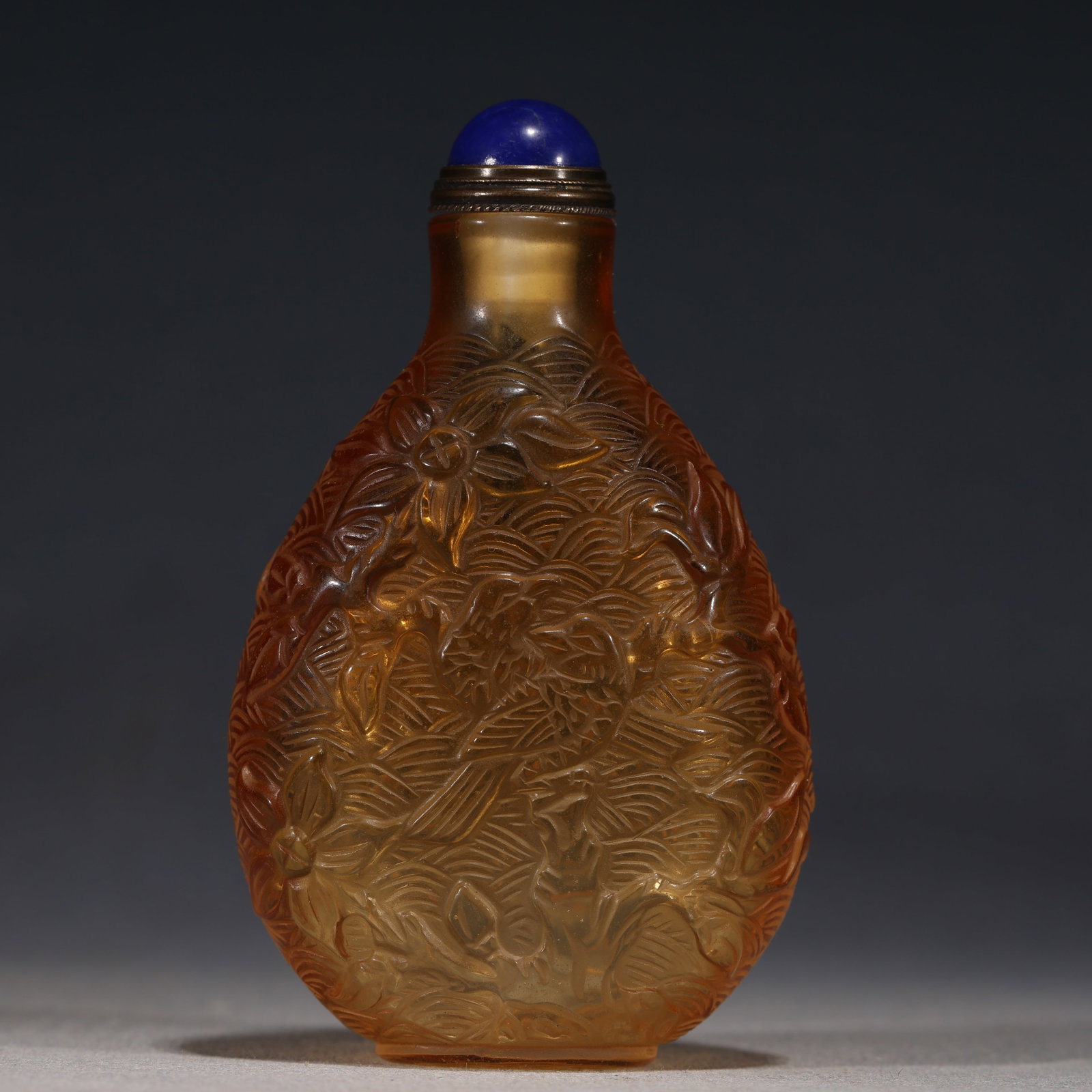 An Exquisite Yellow Glass Relief Flower Butterfly Pattern Water-drop Shaped Snuff Bottle: An Exquisite Yellow Glass Relief Flower Butterfly Pattern Water-drop Shaped Snuff Bottle,Qing Dynasty, China,Qianlong Four-character Mark,Size:2.2in×1in×3.5in 黄色琉璃