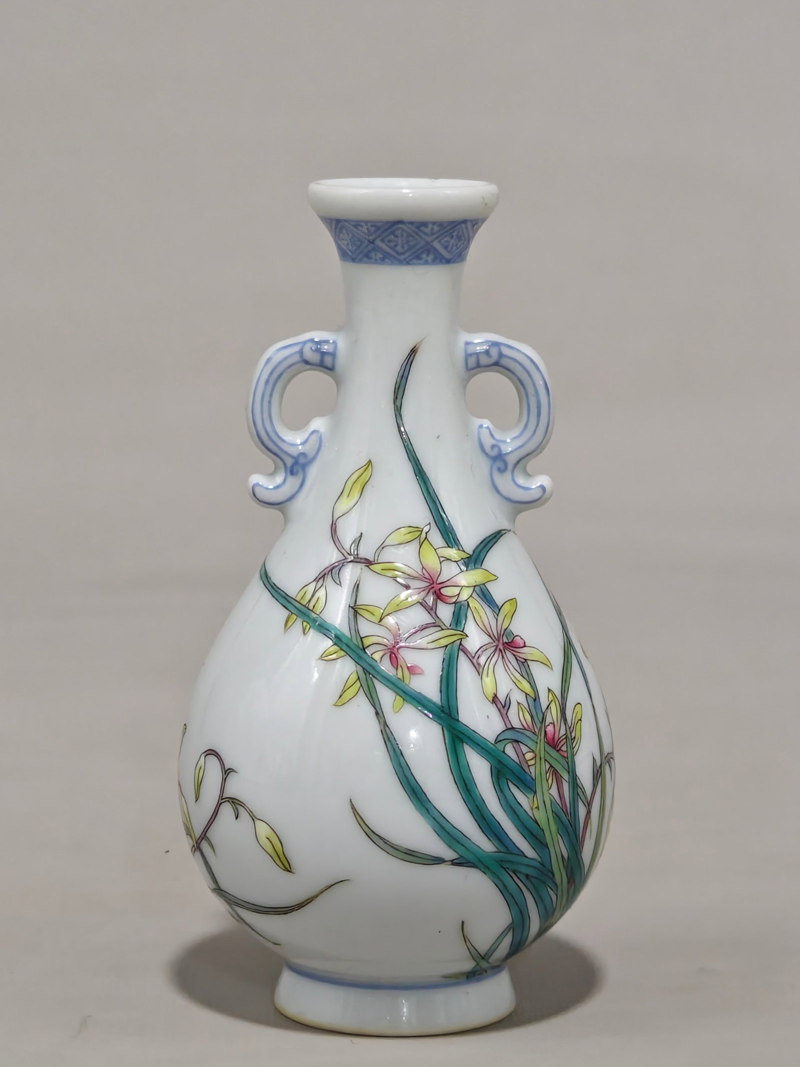 An Exquisite Enamel Flower Pattern Double-Ears Vase,with poem: An Exquisite Enamel Flower Pattern Double-Ears Vase,with poem,Qing Dynasty,China,Qianlong Four-character Mark,Size:3.9inx2.4in 珐琅彩花卉纹双耳瓶,