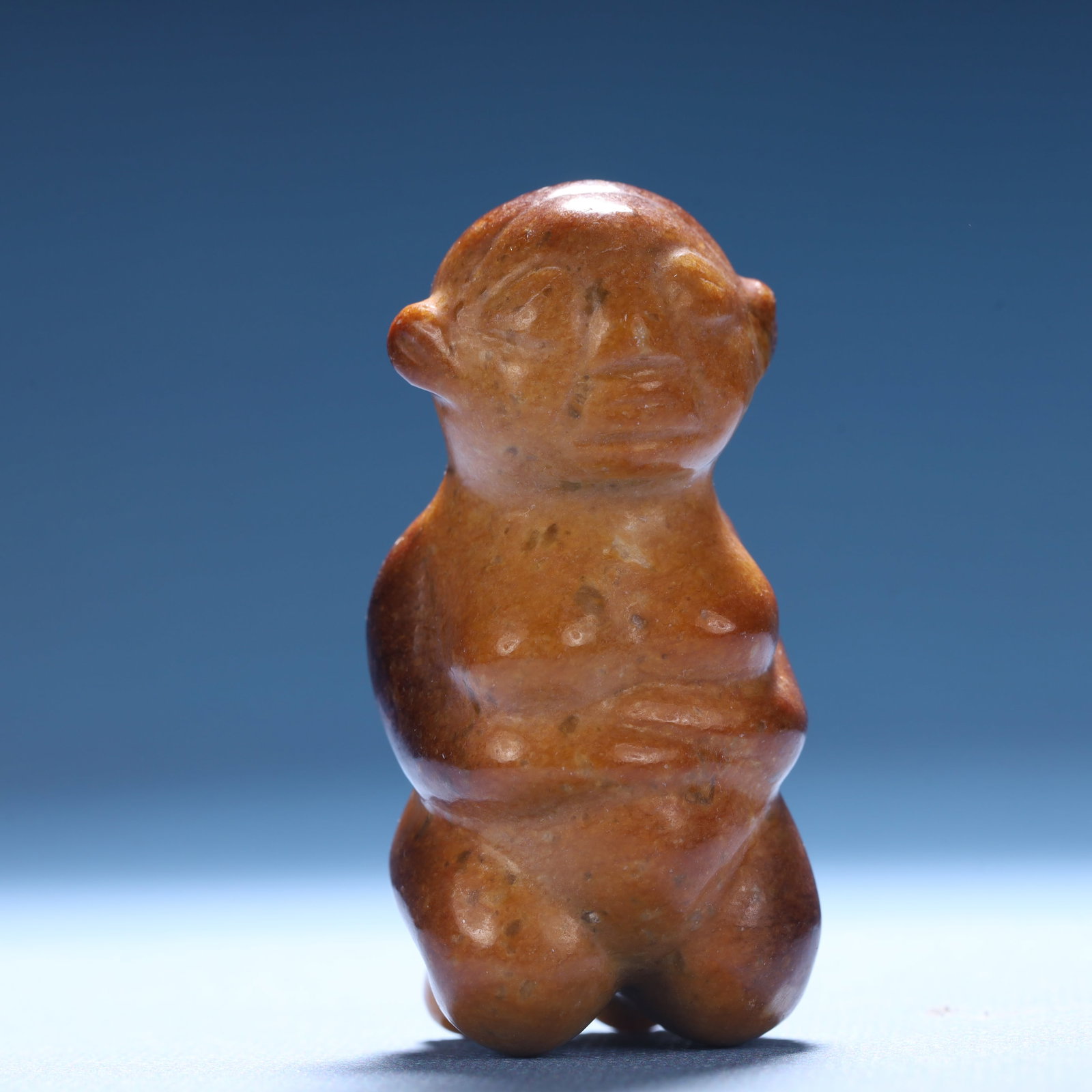 An Archaic Hongshan Culture Yellow Jade Figure Ornament: An Archaic Hongshan Culture Yellow Jade Figure Ornament,Ancient Time,China,Size:2.4inx1.1inx1.1in,Weight:81.4g 红山文化黄玉人物摆件,中