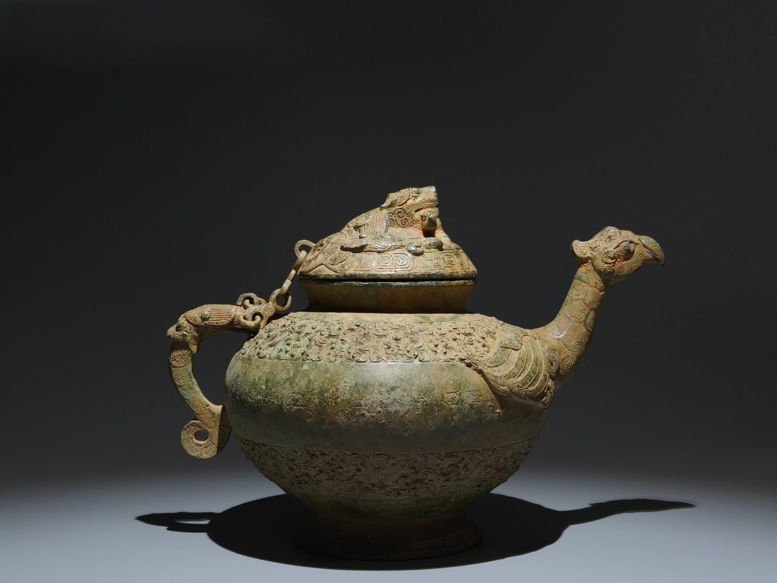 An Archaic Bronze Bird Censer: An Archaic Bronze Bird Censer,the Warring States period in China,Size:9.1inx12.6inx7.9in 青铜鸟香炉,中国战国时期