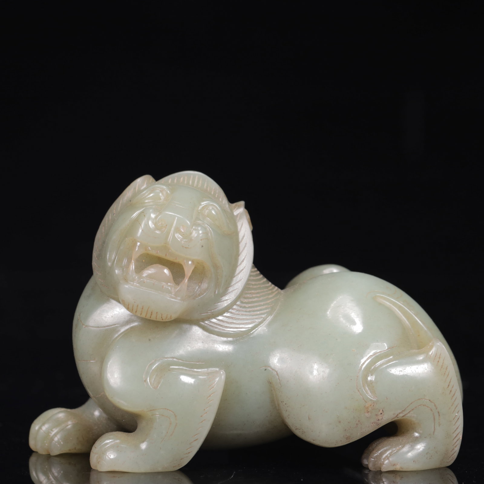 An Exquisite Greenish Jade Auspicious Beast Ornament: An Exquisite Greenish Jade Auspicious Beast Ornament,Qing Dynasty,China,Size:3.5inx2inx2.8in,Weight:427g 青白玉瑞兽摆件,中国清代
