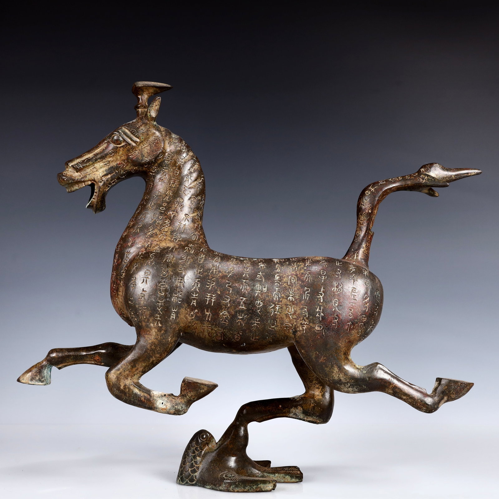 A Rare Bronze Horse Ornament,With Inscription: A Rare Bronze Horse Ornament,With Inscription,Han Dynasty, China,Size:17.3inx4.7inx15.7in,Weight:4150g 青铜马摆件,带铭文,中国汉代