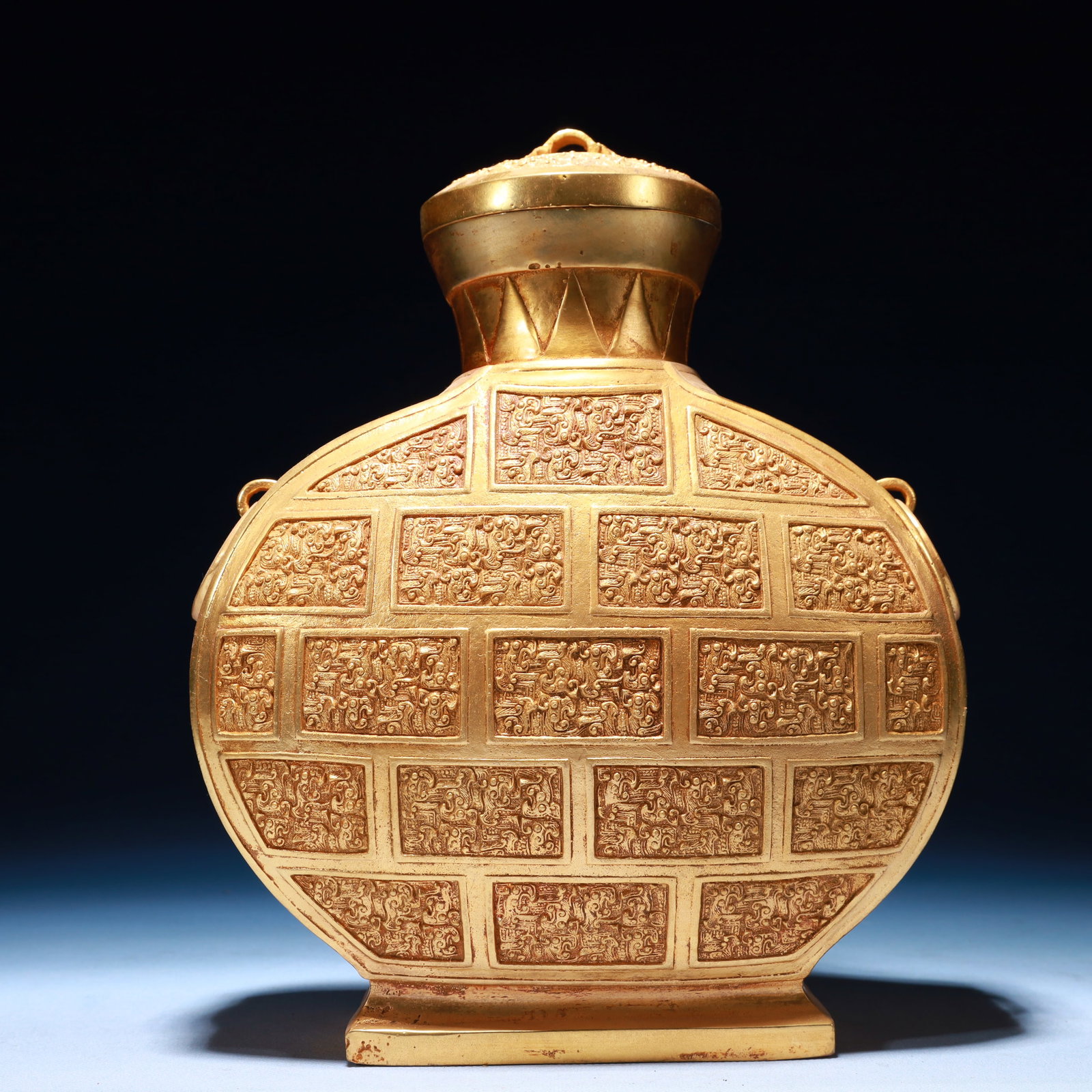 An Exquisite Gilt Bronze Auspicious Beast Pattern Double-Ears Vase,with Cover: An Exquisite Gilt Bronze Auspicious Beast Pattern Double-Ears Vase,with Cover,Qing Dynasty,China,Size:8.7inx3.5inx11in,Weight:3200g 铜鎏金瑞兽纹双耳