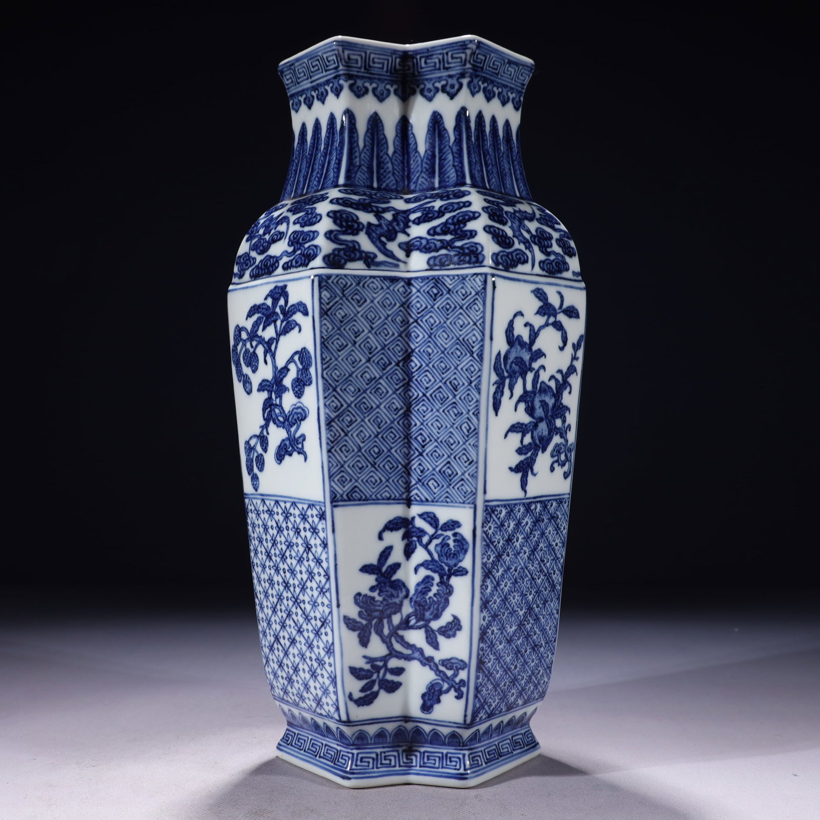 An Exquisite Blue and White Flower and Fruit Pattern Vase: An Exquisite Blue and White Flower and Fruit Pattern Vase,Qing Dynasty,China,Qianlong Six-character Mark,Size:7.1inx5.5inx14in,Weight:2600g 青花花果纹瓶,中