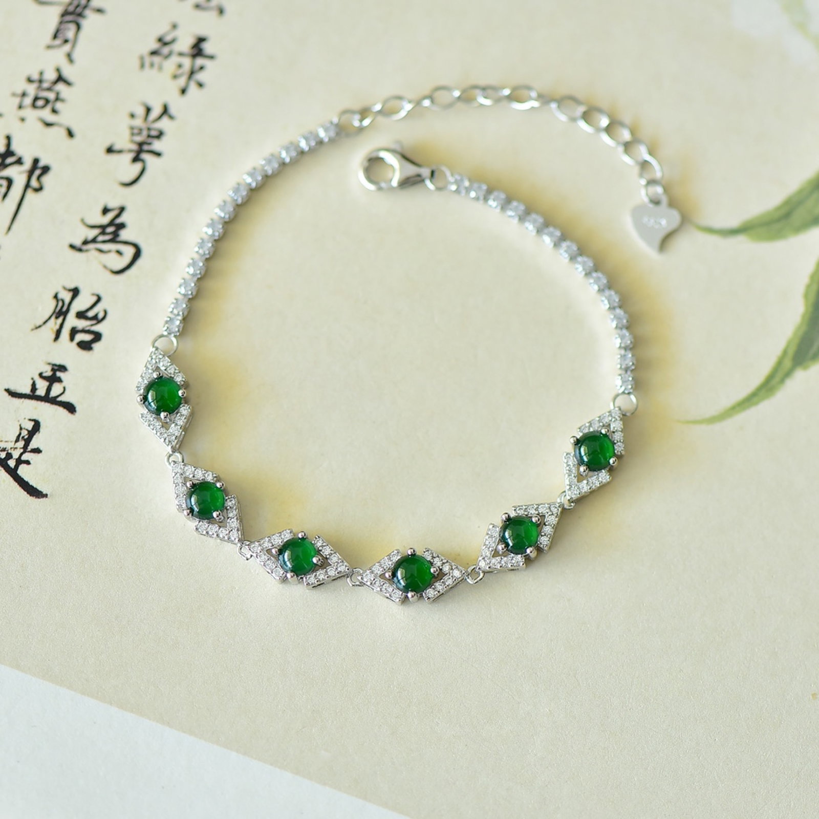 An Exquisite Sterling Silver Inlaid Jadeite Bracelets,Inlaid Diamond: An Exquisite Sterling Silver Inlaid Jadeite Bracelets,Inlaid Diamond,Size:4mmx4mm 纯银镶翡翠手链,嵌钻石