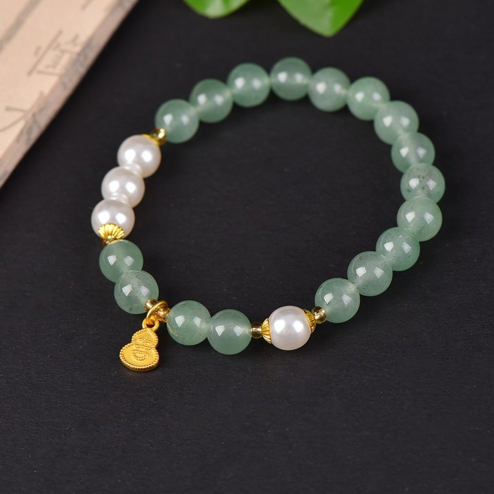 An Exquisite Greenish Jade Bracelets (1 of 5)