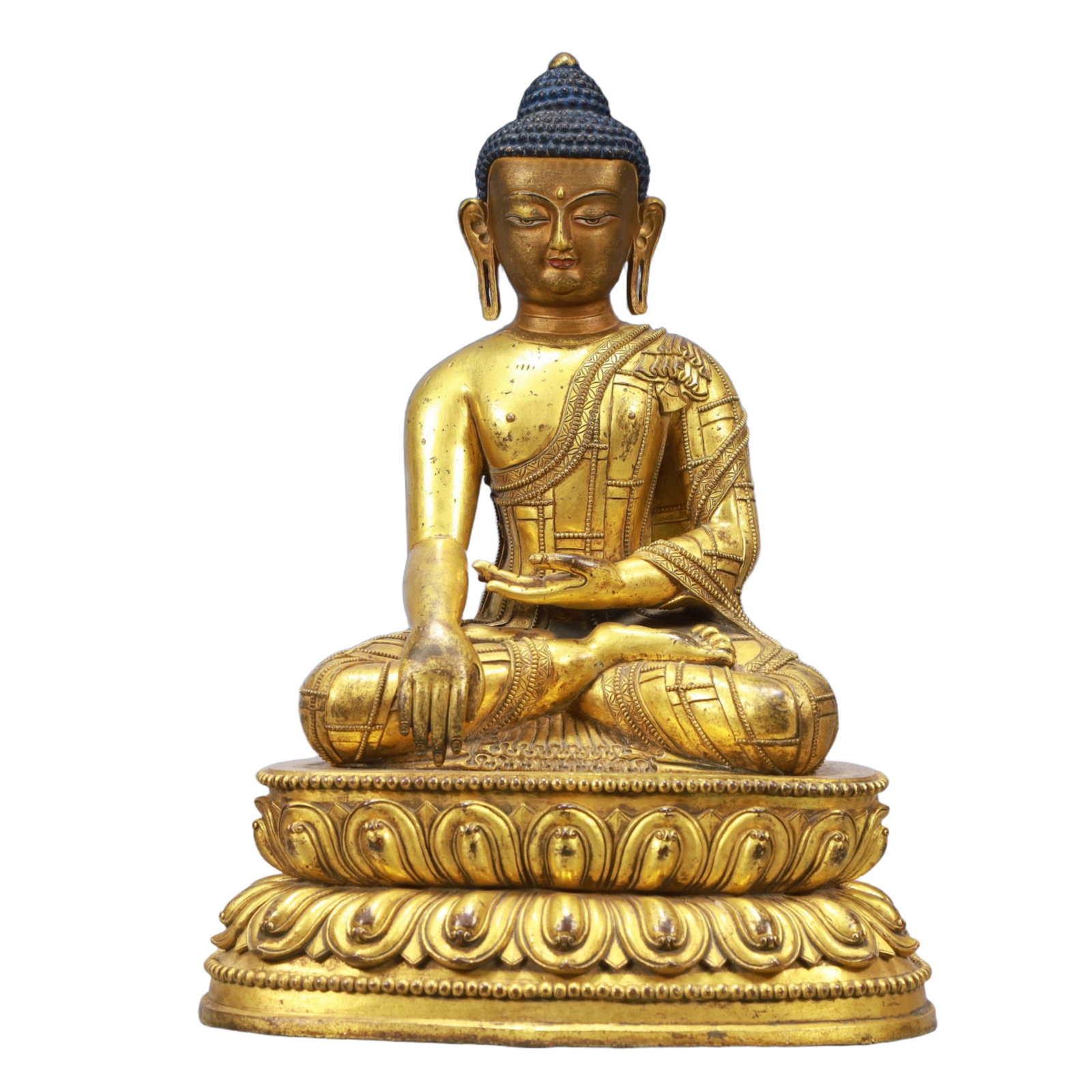 A Solemn Gilt Bronze Statue of Sakyamuni: A Solemn Gilt Bronze Statue of Sakyamuni ,Ming Dynasty, China,Size:9.4inx6.3inx13.4in Weight:6250g 铜鎏金释迦牟尼像,中国明代