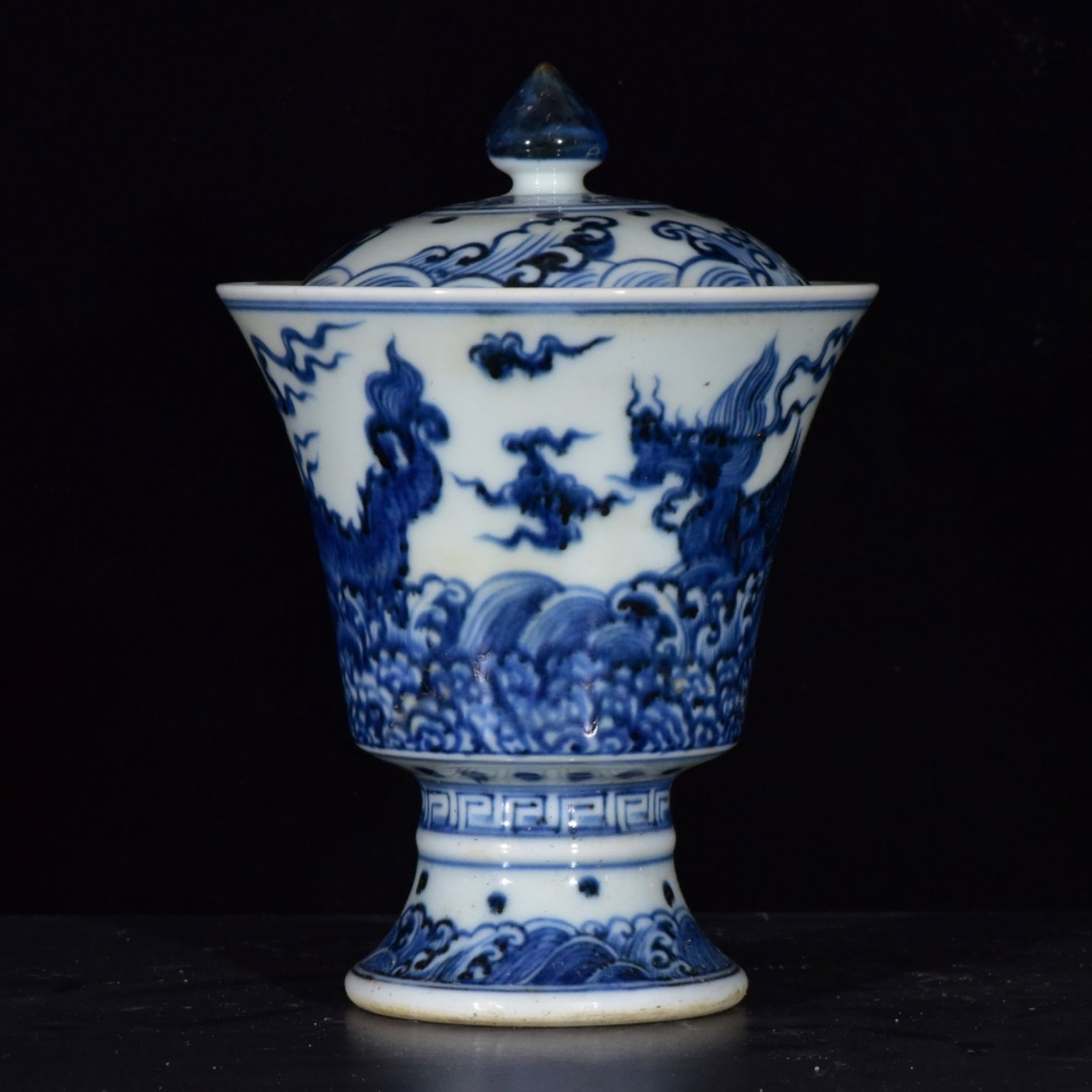 An Exquisite Blue and White Seawater and Dragon Pattern Bowl with Cover: An Exquisite Blue and White Seawater and Dragon Pattern Bowl with Cover,Ming Dynasty,China,Xuande Six-character Mark,Size:6.7inx4.9in