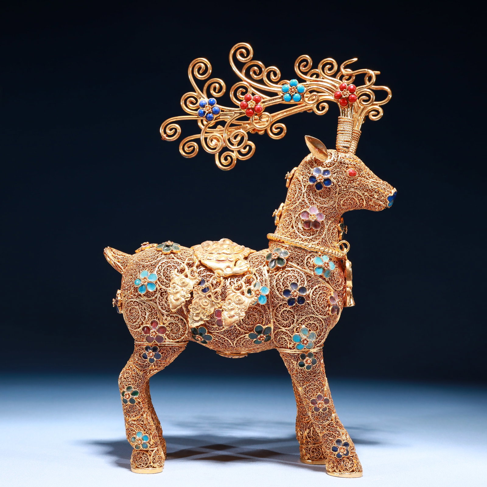 An Exquisite Filigree and Gilding Flower Pattern Deer Ornament,Inlaid Gems: An Exquisite Filigree and Gilding Flower Pattern Deer Ornament,Inlaid Gems,Qing Dynasty,China,Qianlong Four-character Mark,Size:7.9inx3.1inx11.4in,Weight:850g