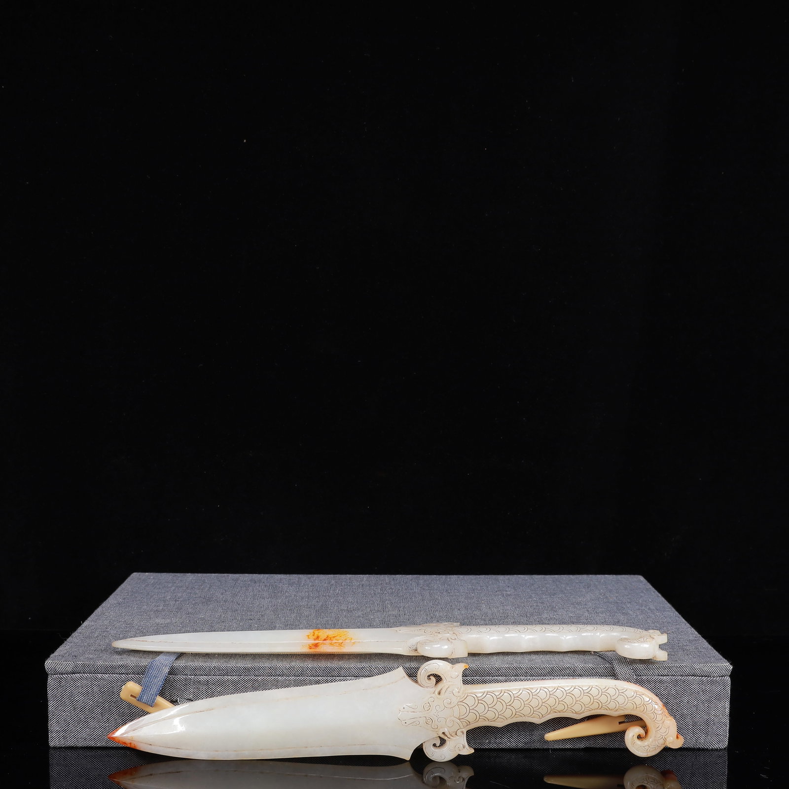 A Set of Fine White Jade Swords: A Set of Fine White Jade Swords,Qing Dynasty,China,Size:2inx0.4inx10.2in,Weight:724g 一套白玉剑,中国清代