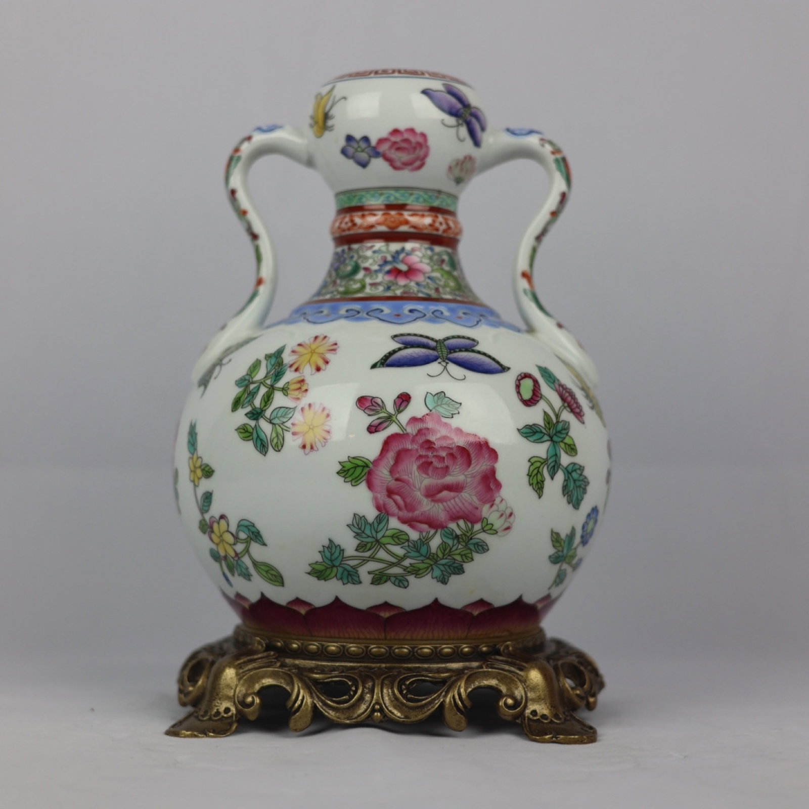 An Exquisite Famille-Rose Inlaid Bronze Flower and Butterfly Pattern Double-Ears Vase: An Exquisite Famille-Rose Inlaid Bronze Flower and Butterfly Pattern Double-Ears Vase,Qing Dynasty,China,Yongzheng Four-character Mark,Size:11inx6.9in 粉彩镶铜花卉&