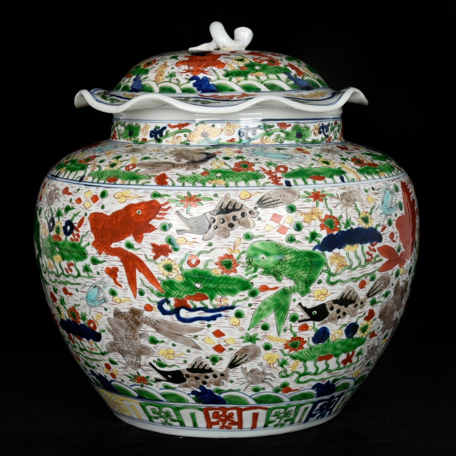 A Rare Blue and White Wucai Hornwort Pattern Jar with Cover: A Rare Blue and White Wucai Hornwort Pattern Jar with Cover,Ming Dynasty,China,Jiajing Six-character Mark,Size:13.4inx15in 青花五彩鱼藻纹盖罐,