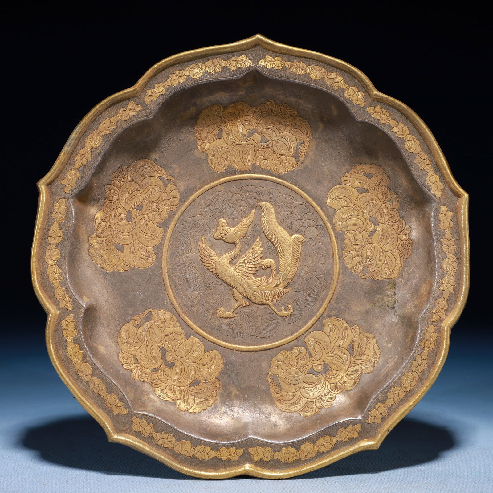 An Exquisite Gilt Bronze Phoenix Pattern Plate: An Exquisite Gilt Bronze Phoenix Pattern Plate,Qing Dynasty,China,Size:9.6inx1inx9.6in,Weight:550g 铜鎏金凤纹盘,中国清代